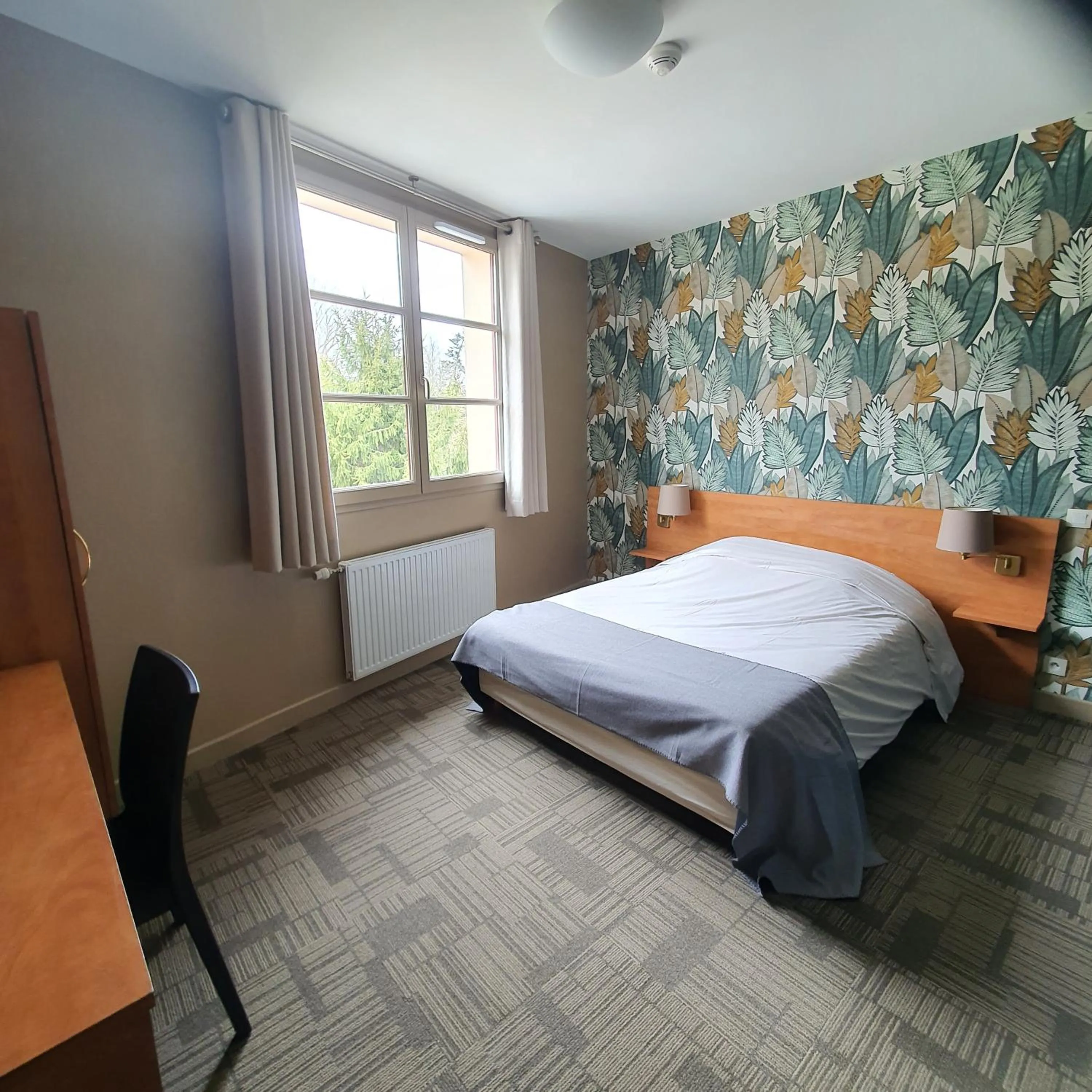 Bed in HOTEL RESTAURANT La CREPERIE Du CHATEAU