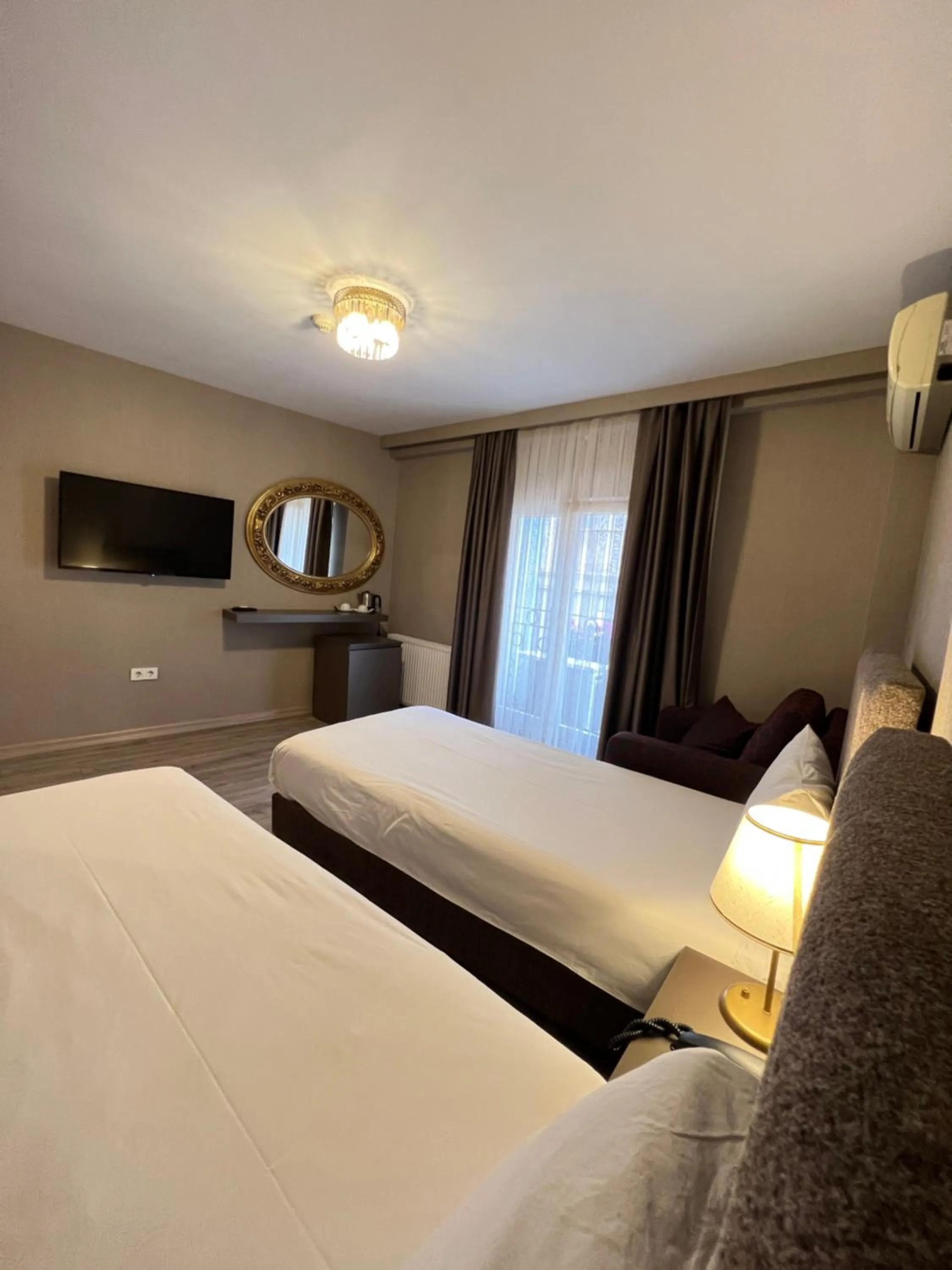 Bed in Flower Palace Hotel