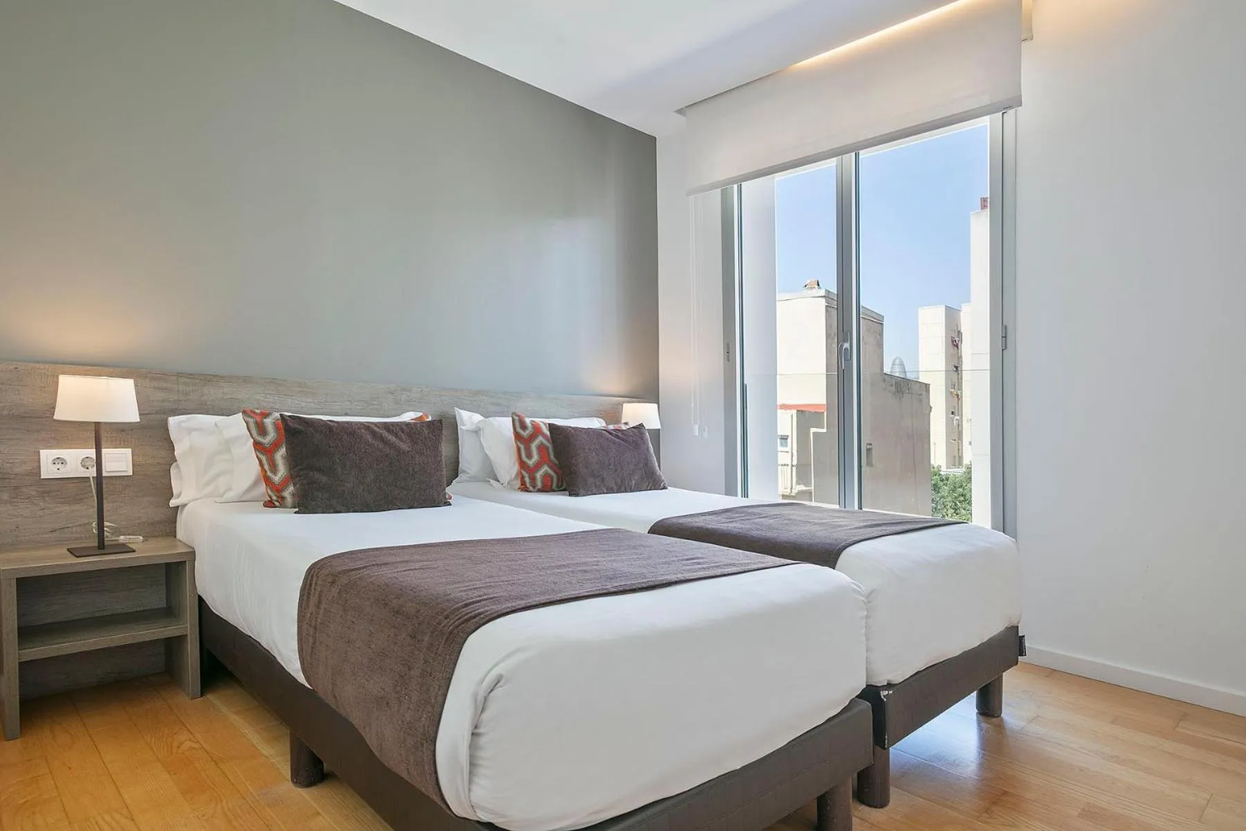 Bed in Lugaris Beach Apartments