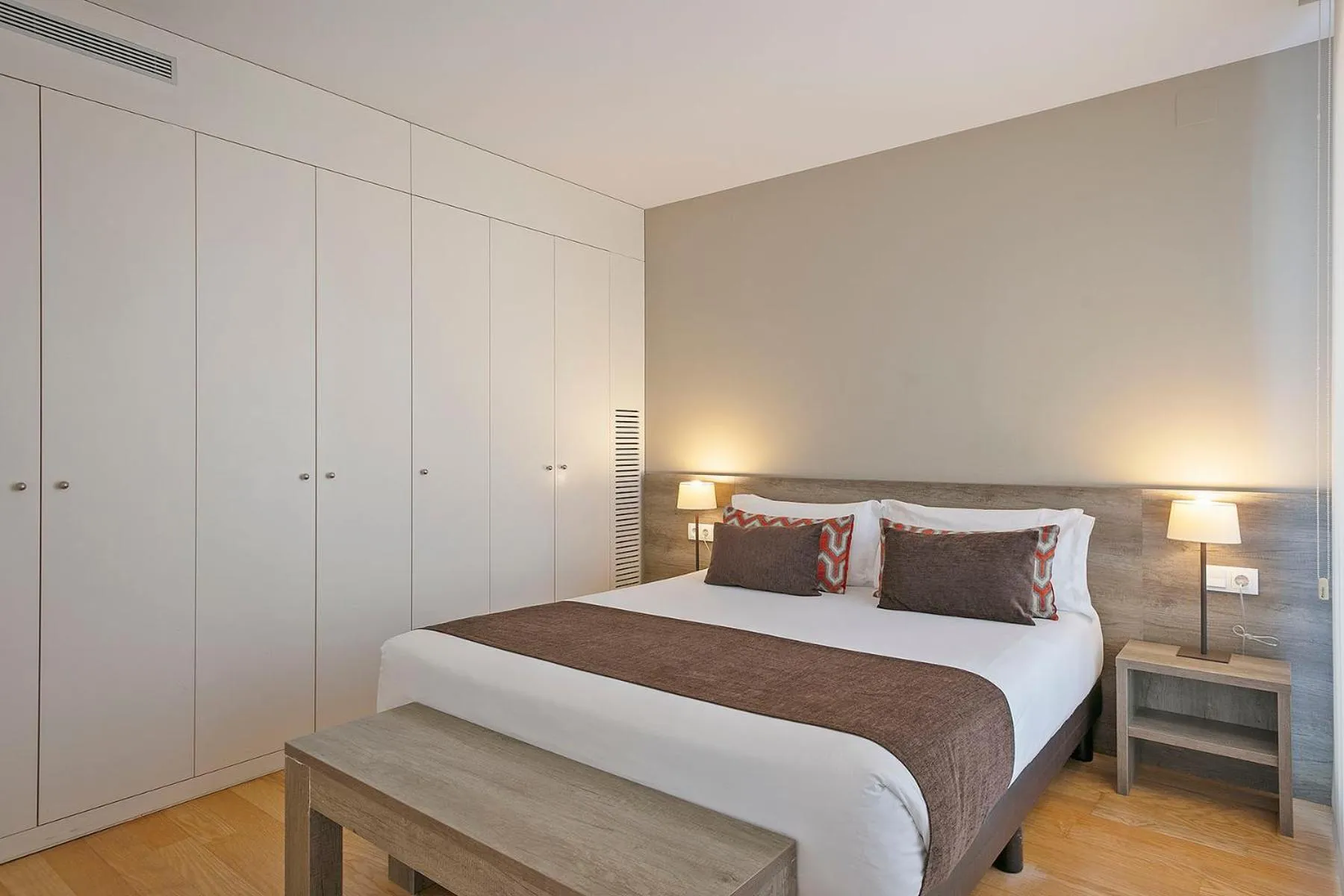 Bed in Lugaris Beach Apartments