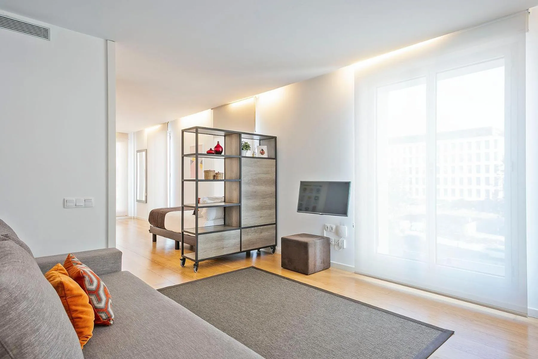 Bed in Lugaris Beach Apartments