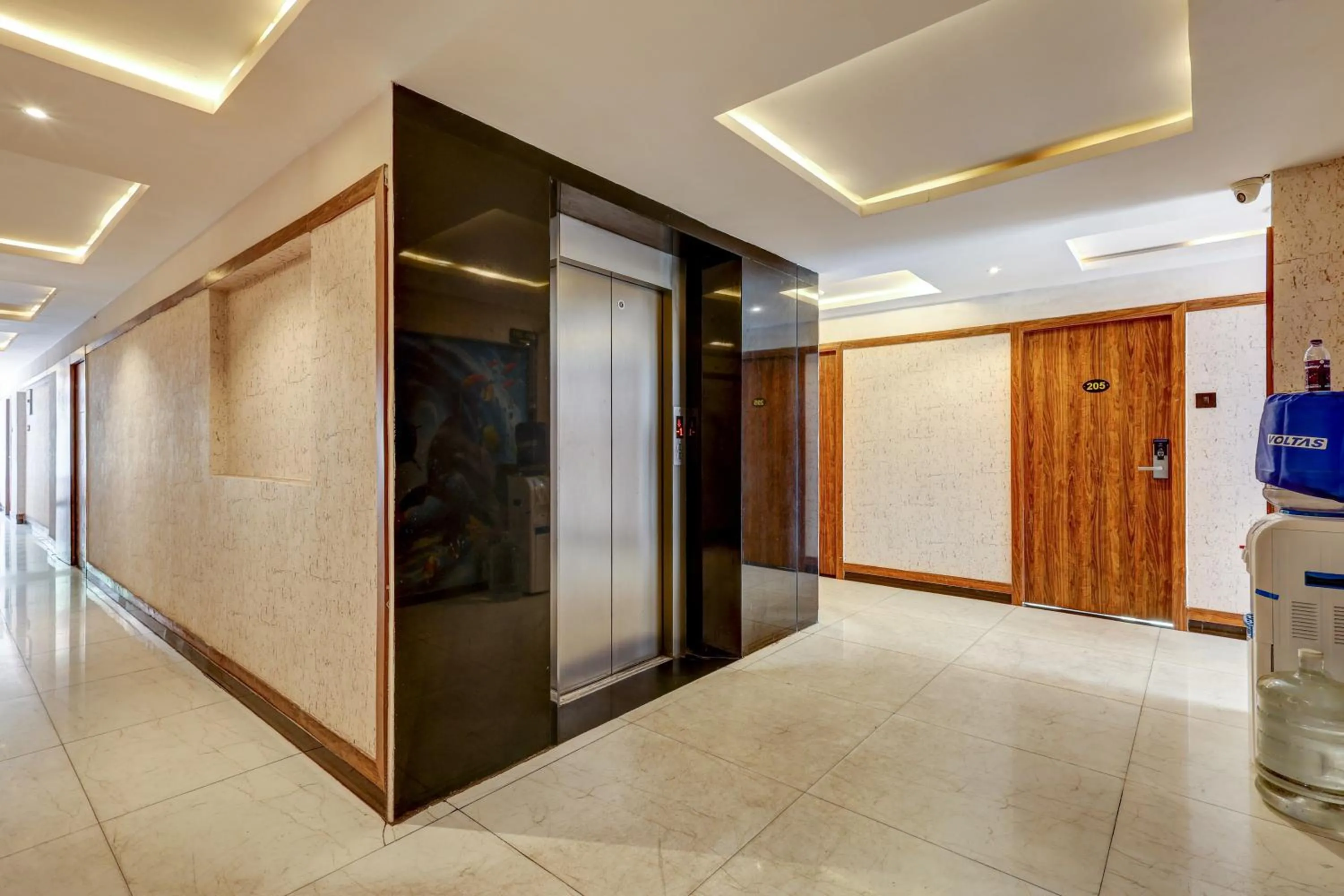 elevator in Treebo Blak & Wite Rk Beach