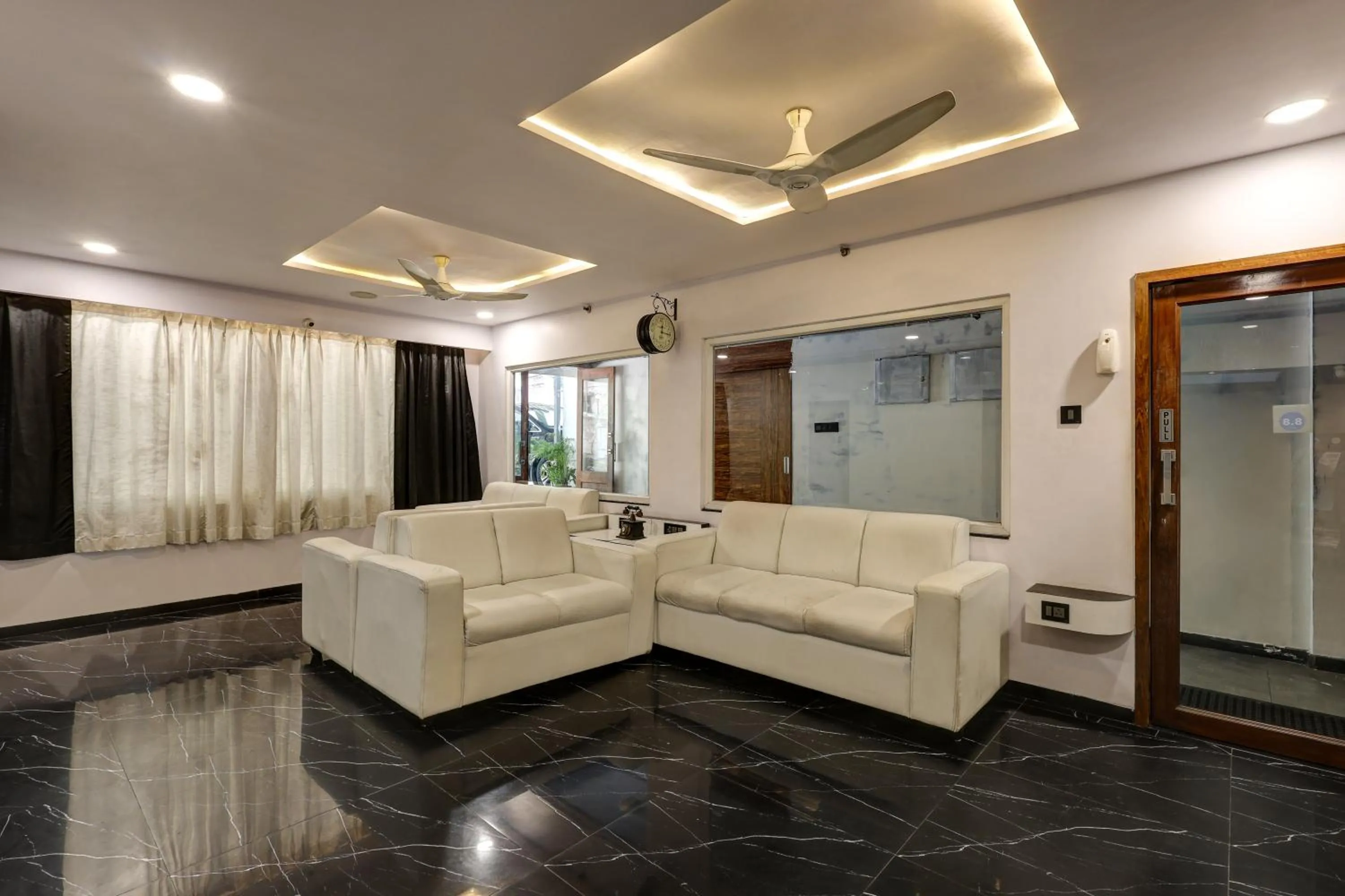 Seating area in Treebo Blak & Wite Rk Beach