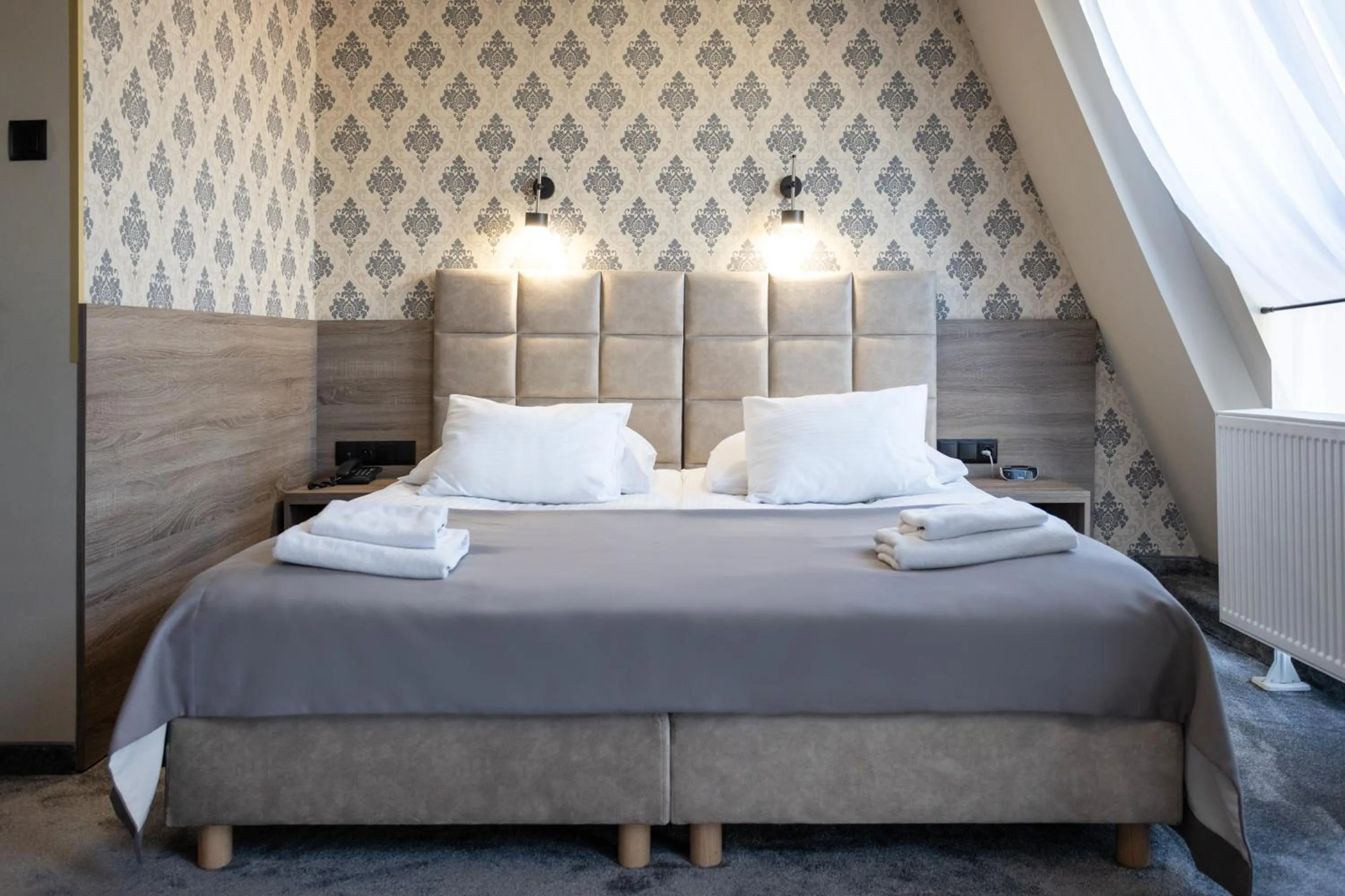 Bed in Hotel Maksymilian