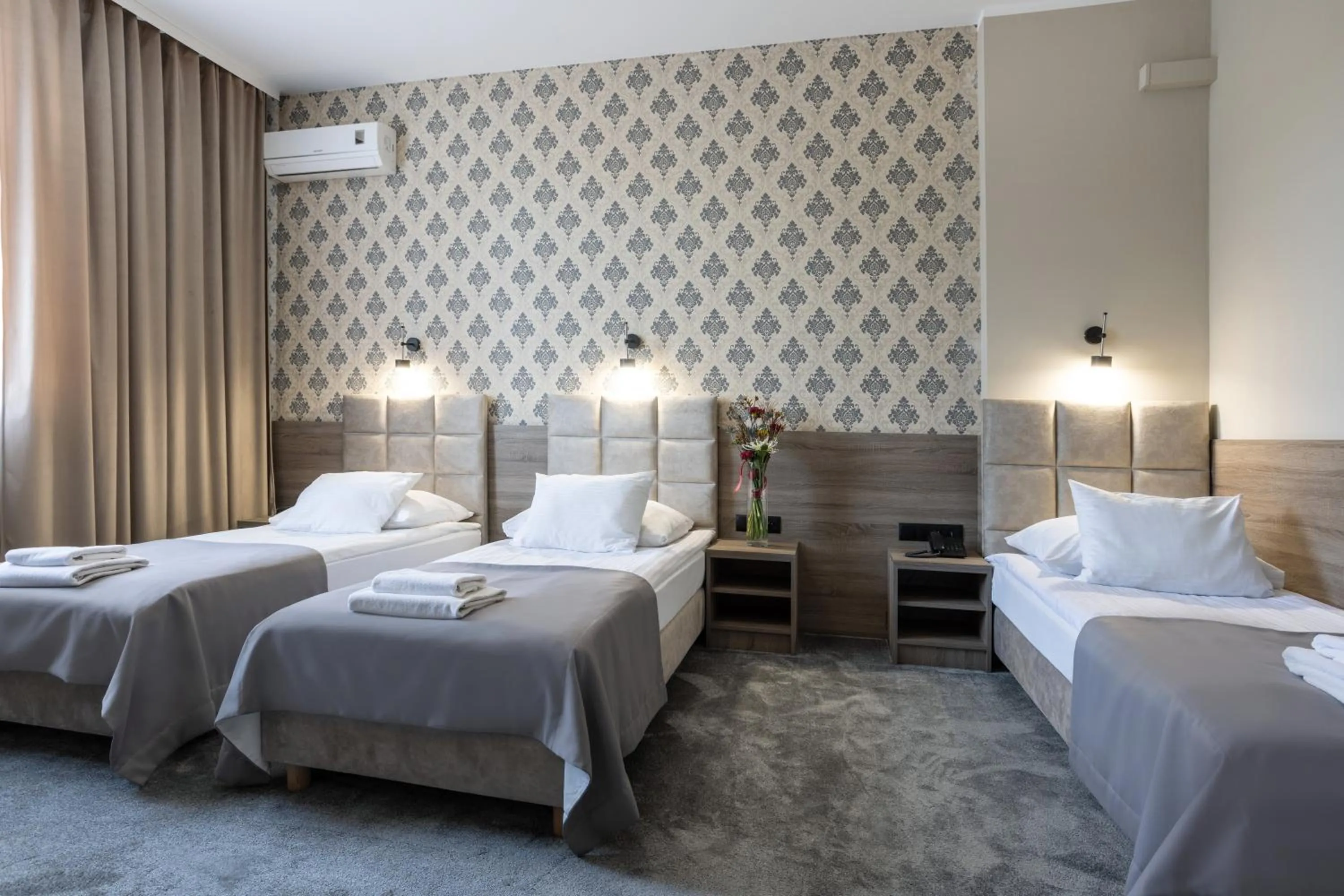 Bed in Hotel Maksymilian