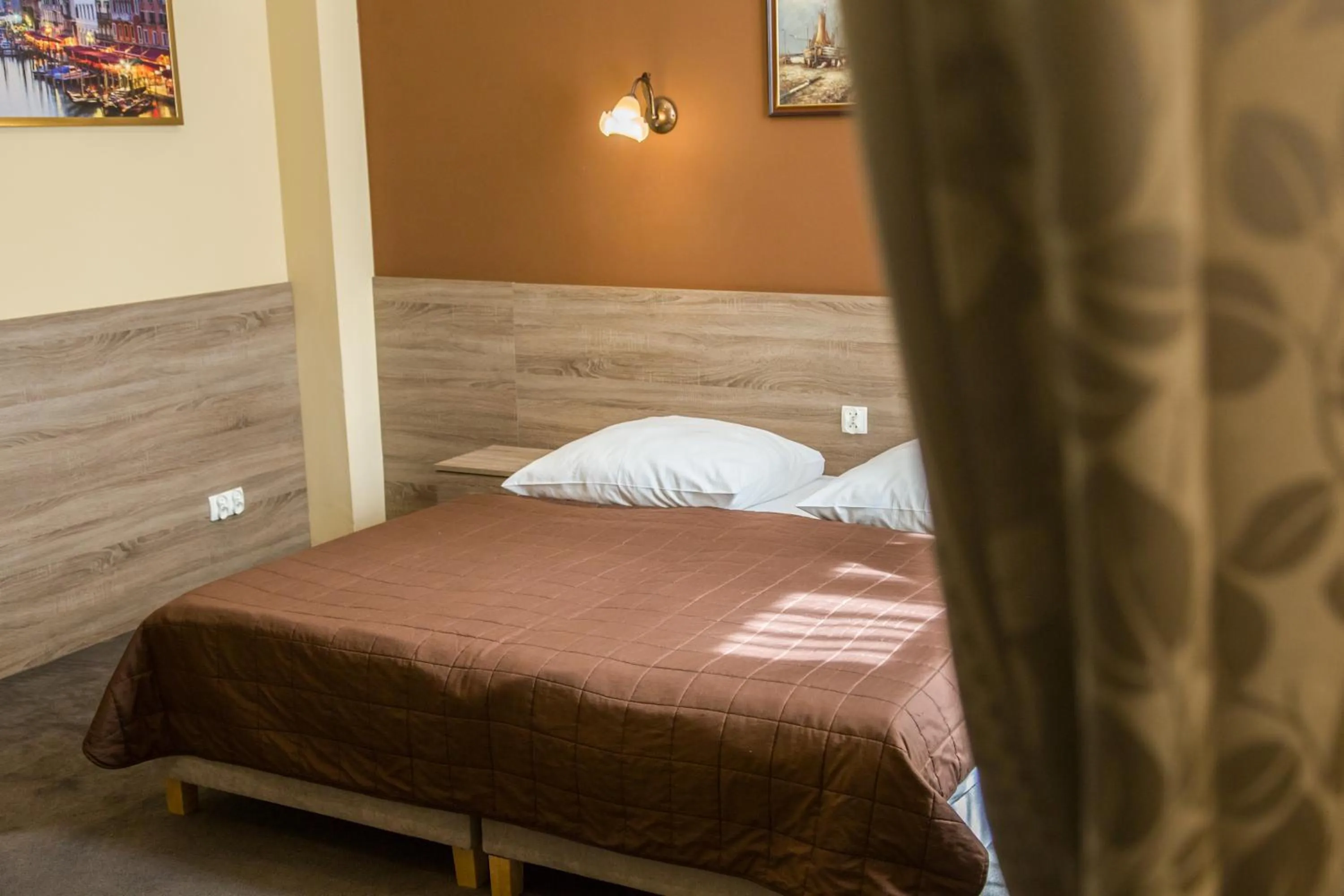 Bed in Hotel Maksymilian