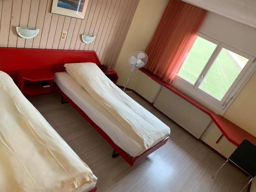 Bed in Hotel Lyssach