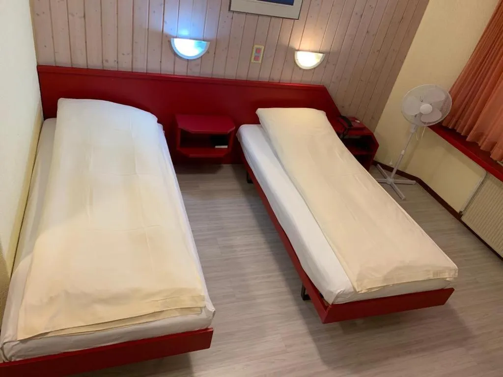 Bed in Hotel Lyssach