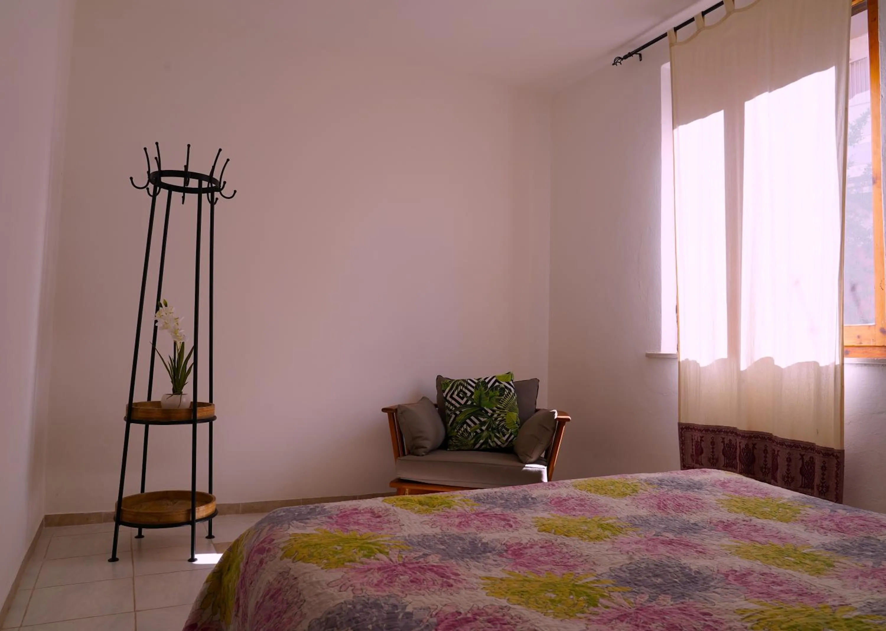 Bed in Flowery Inn Villa