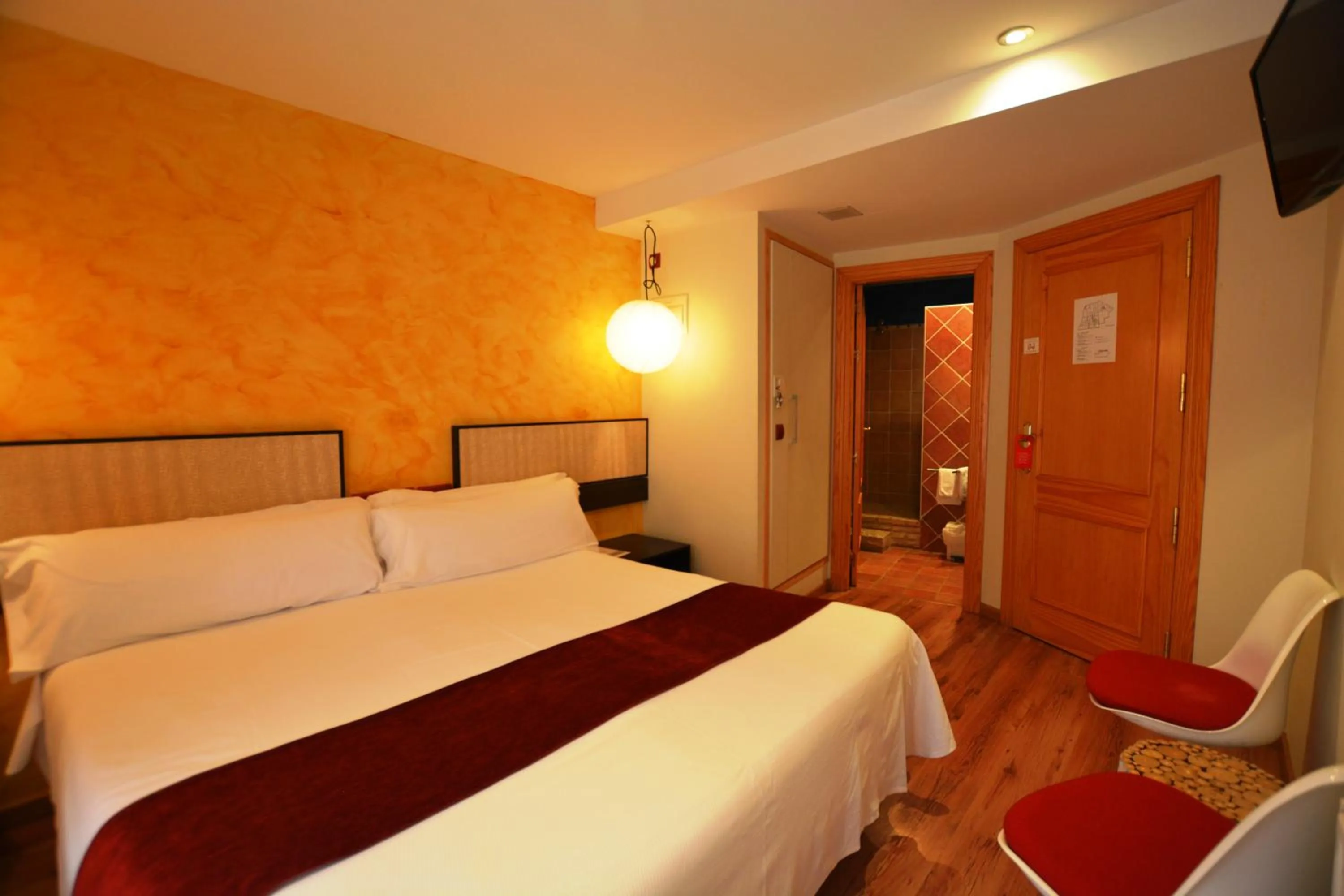 Bed in Hotel Posada Guadalupe