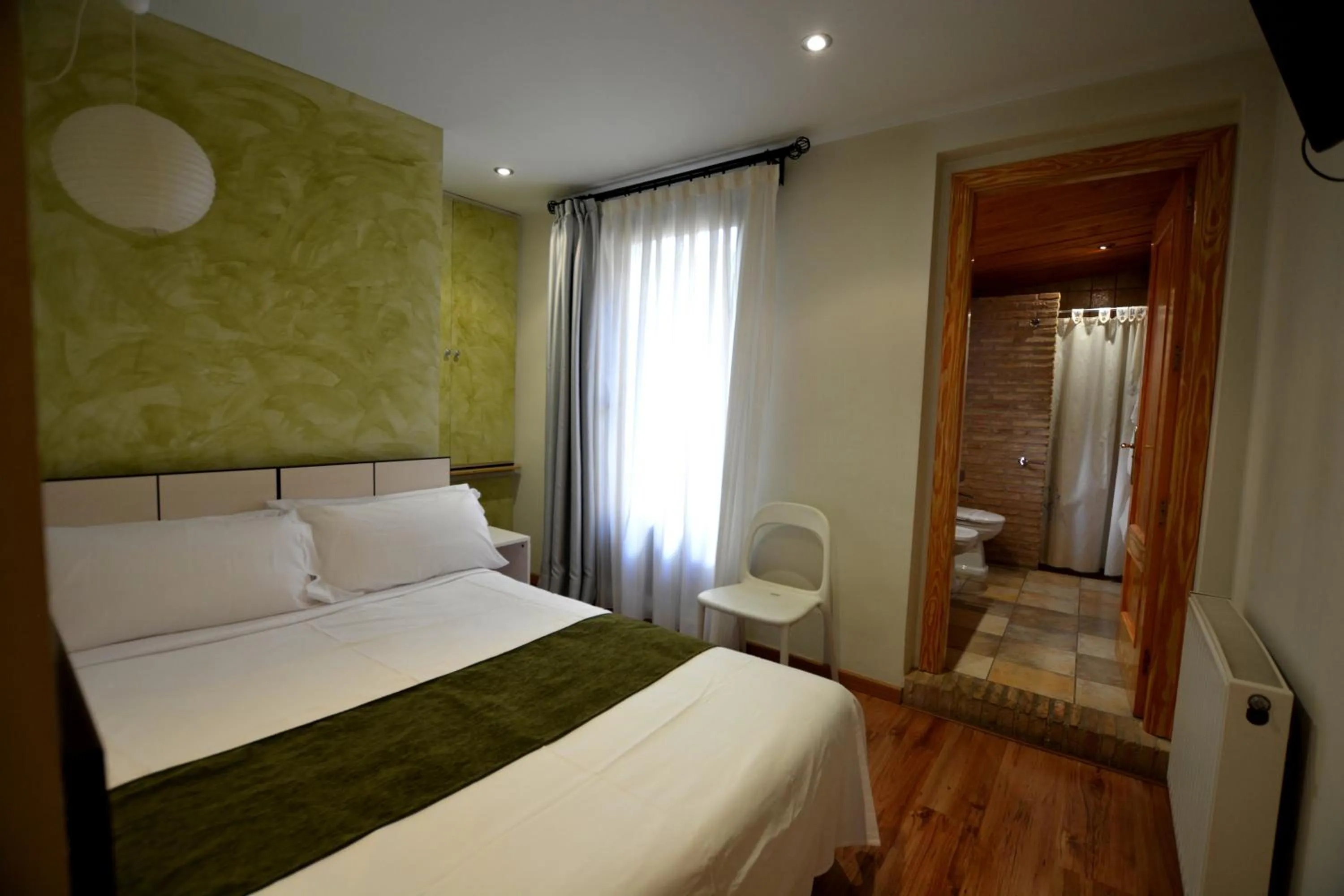 Bed in Hotel Posada Guadalupe