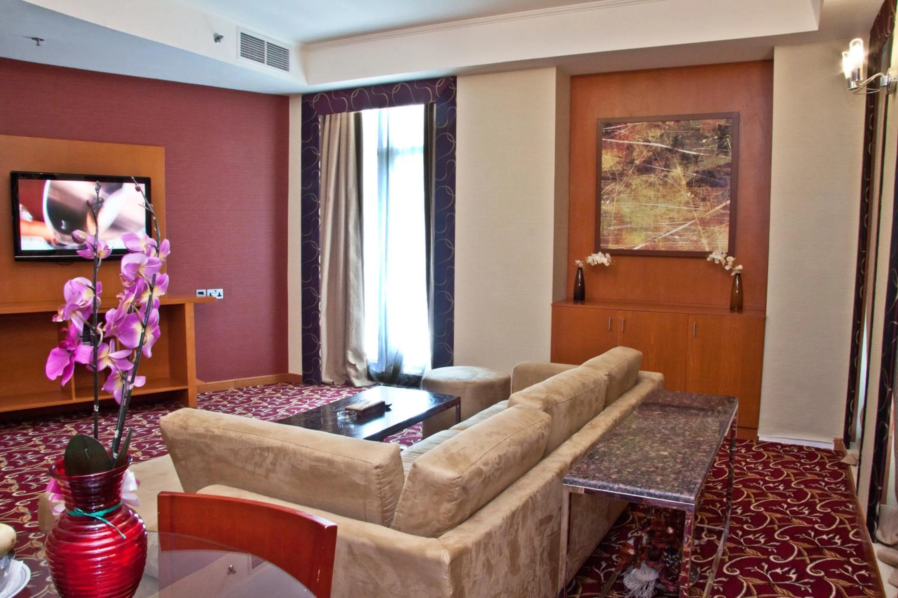 Living room in Ramee Rose Hotel