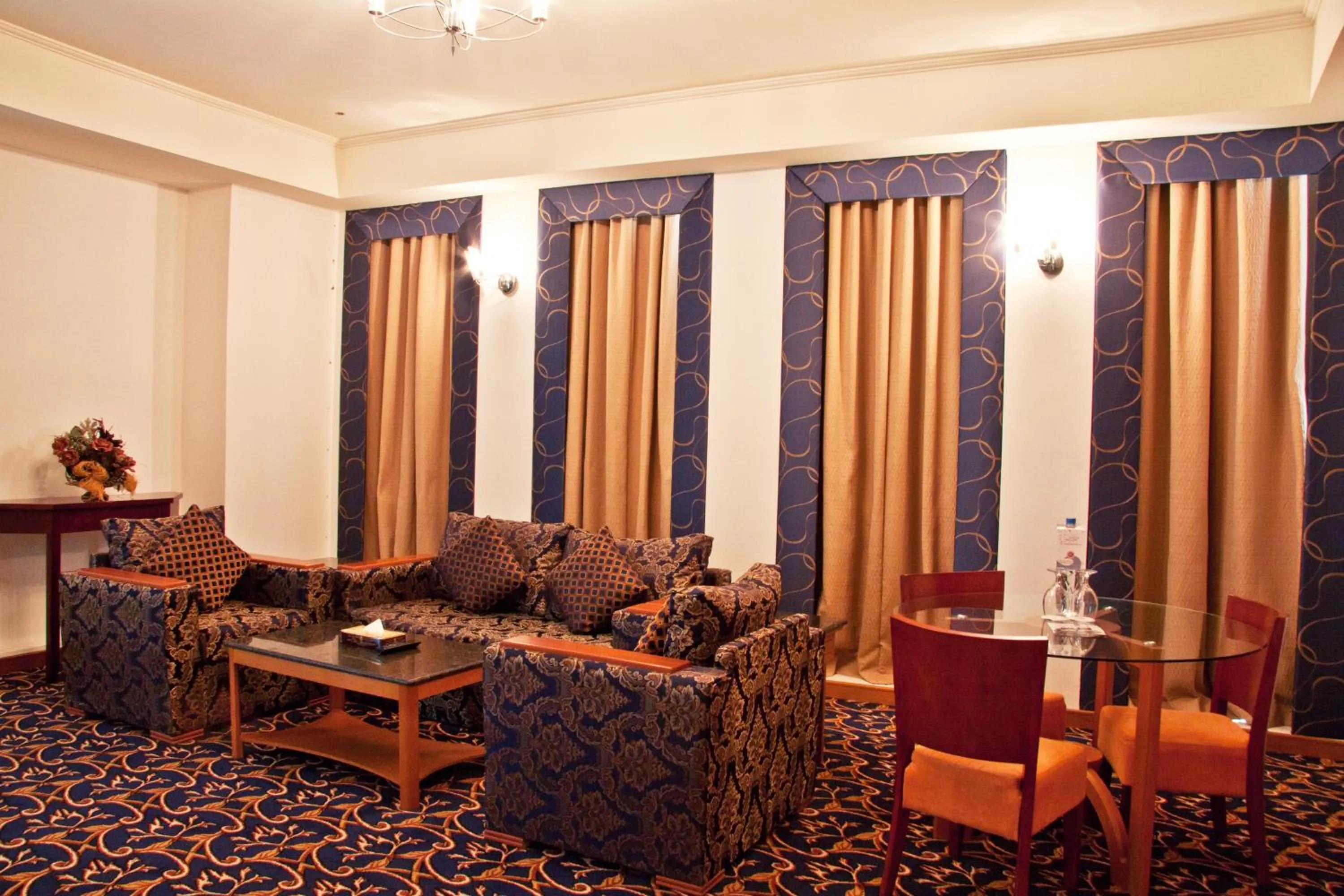 Living room in Ramee Rose Hotel