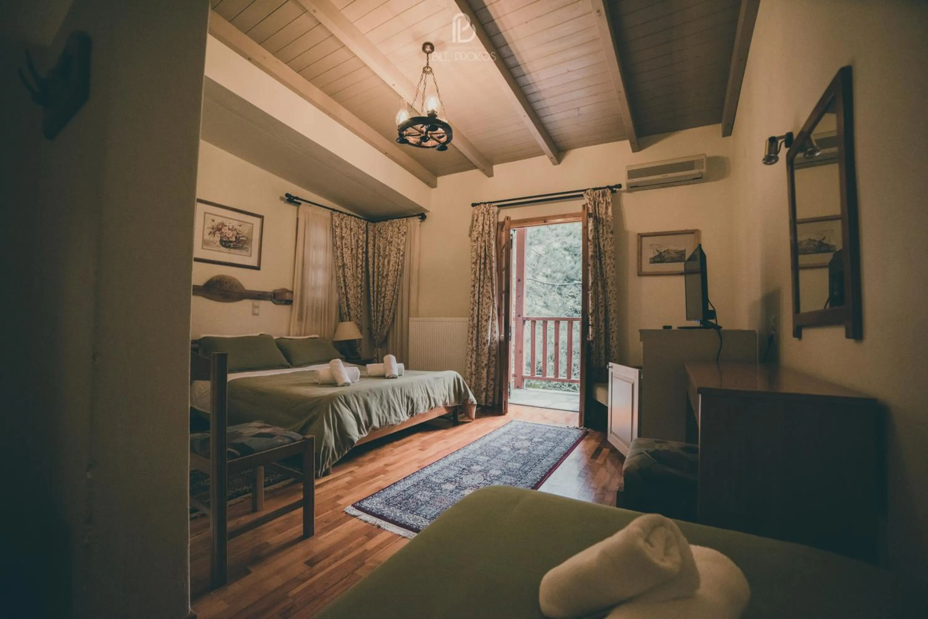 Bed in Bourazani Wild Life Resort