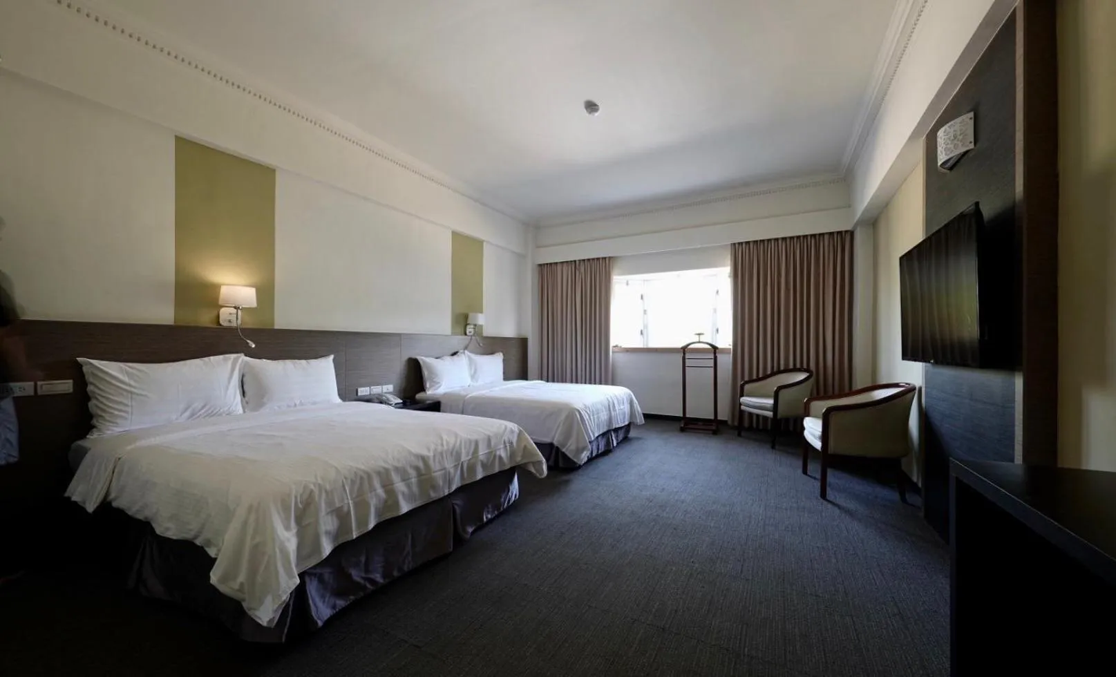 Bed in Haifu Garden Hotel