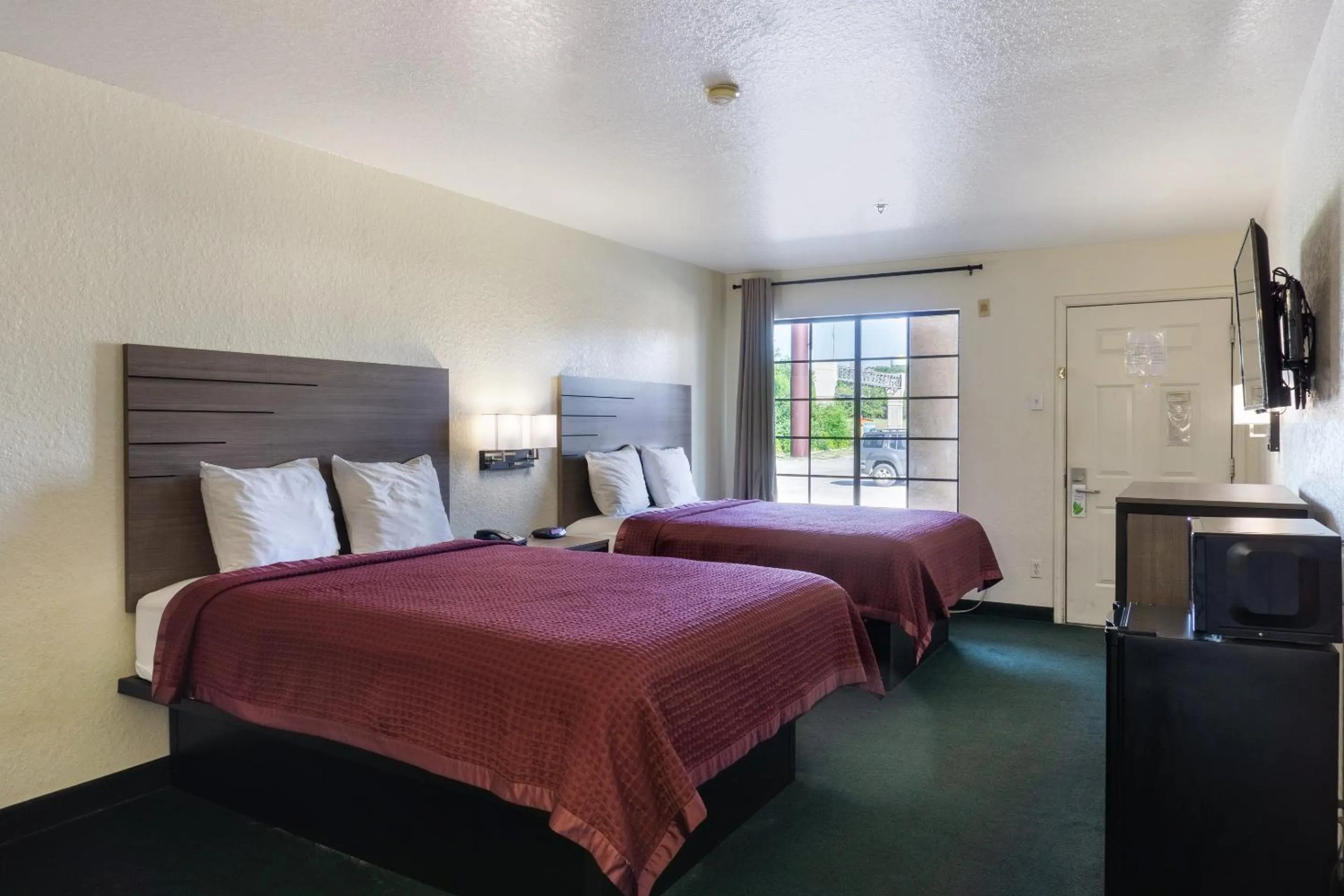 Bedroom, Bed in OYO Inn & Suites Medical Center San Antonio