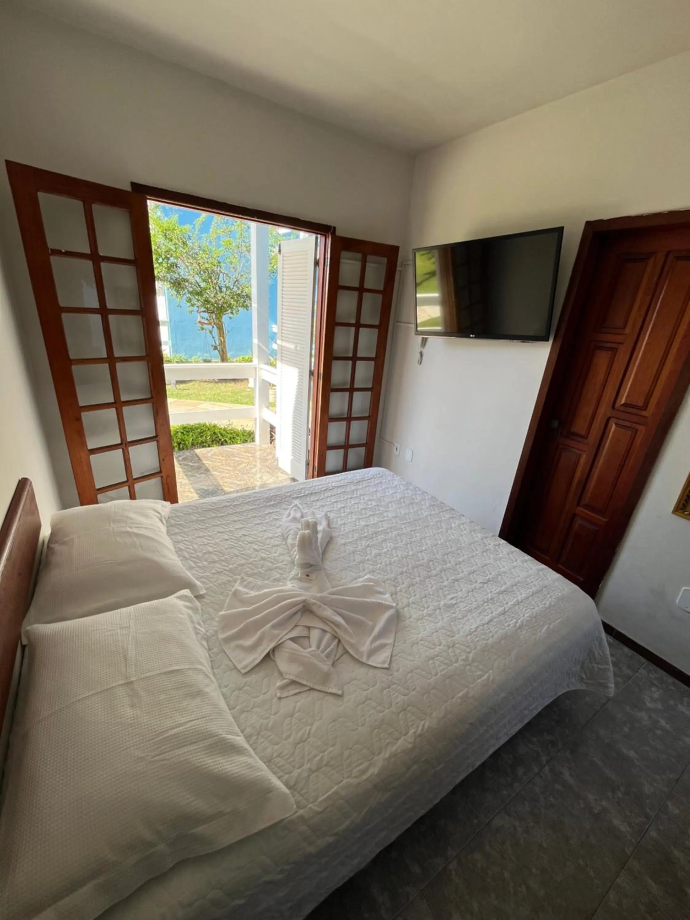 Bed in Pousada Paraíso do Atlântico