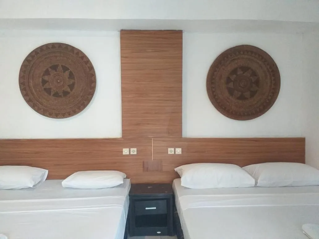 Bed in Gili Sands Hotel & Bar