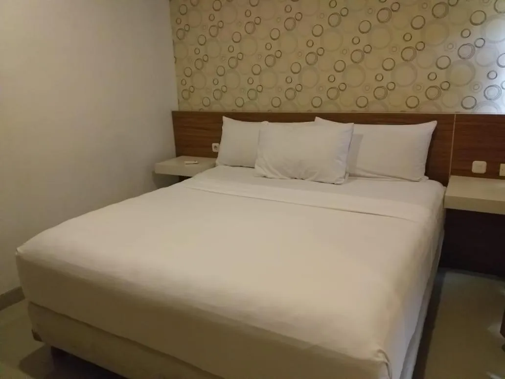 Bed in Gili Sands Hotel & Bar