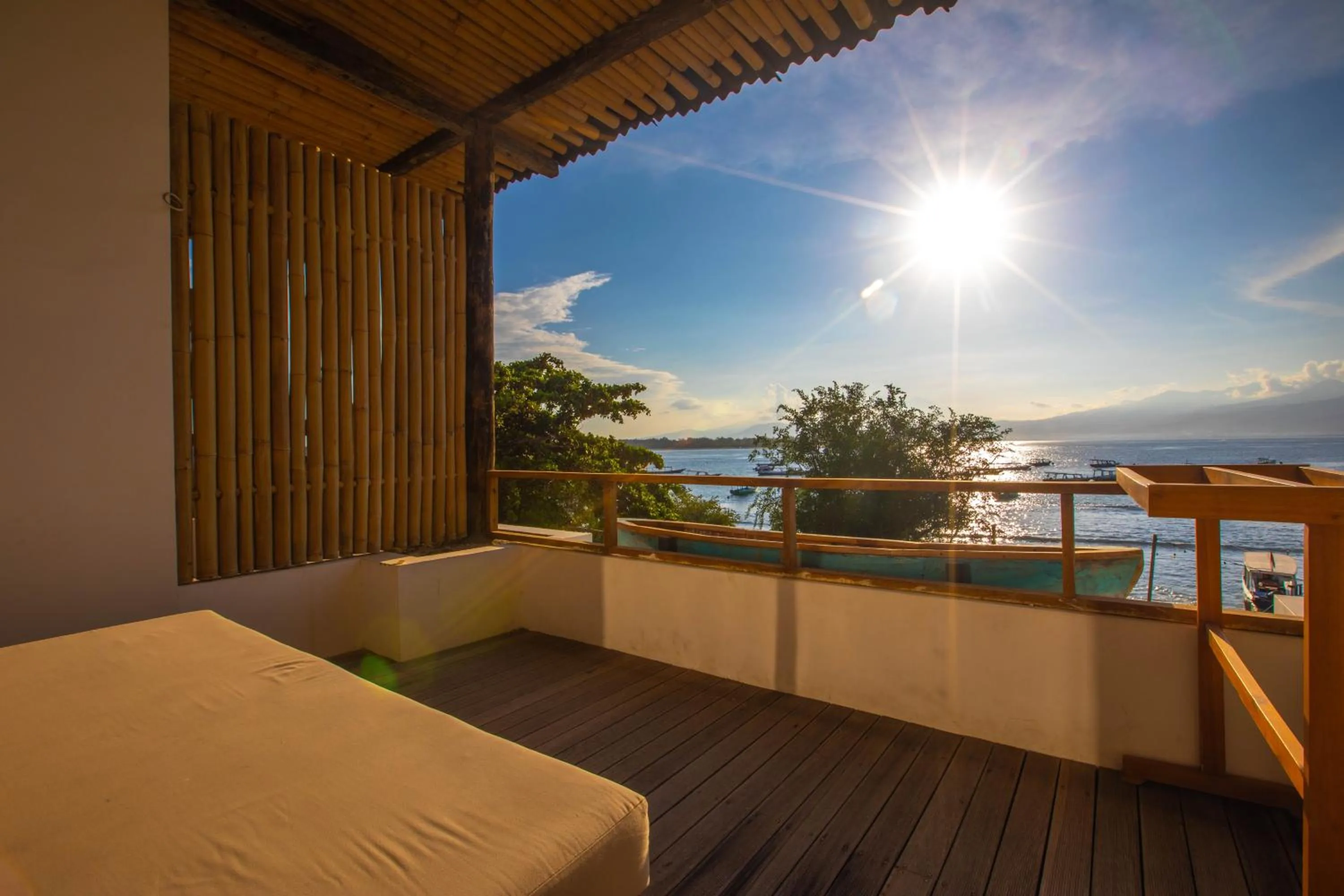 Balcony/Terrace, Bed in Gili Sands Hotel & Bar
