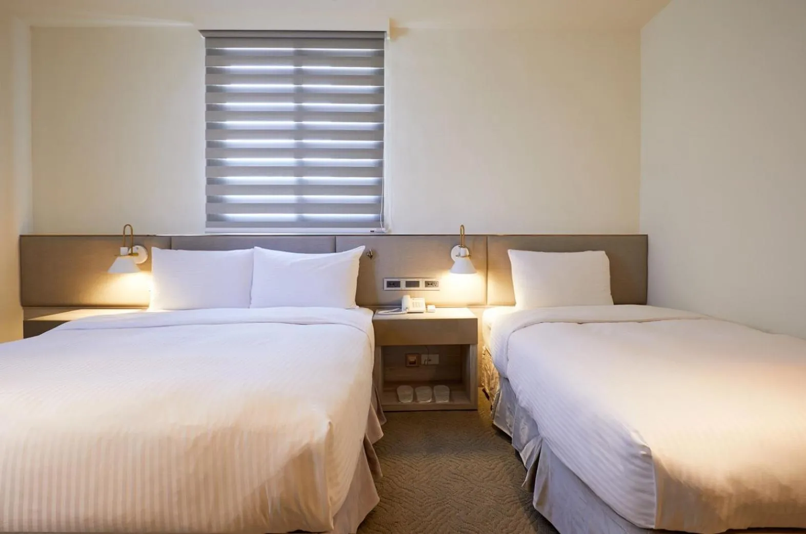 Bed in Hai Fu Hotel & Suites