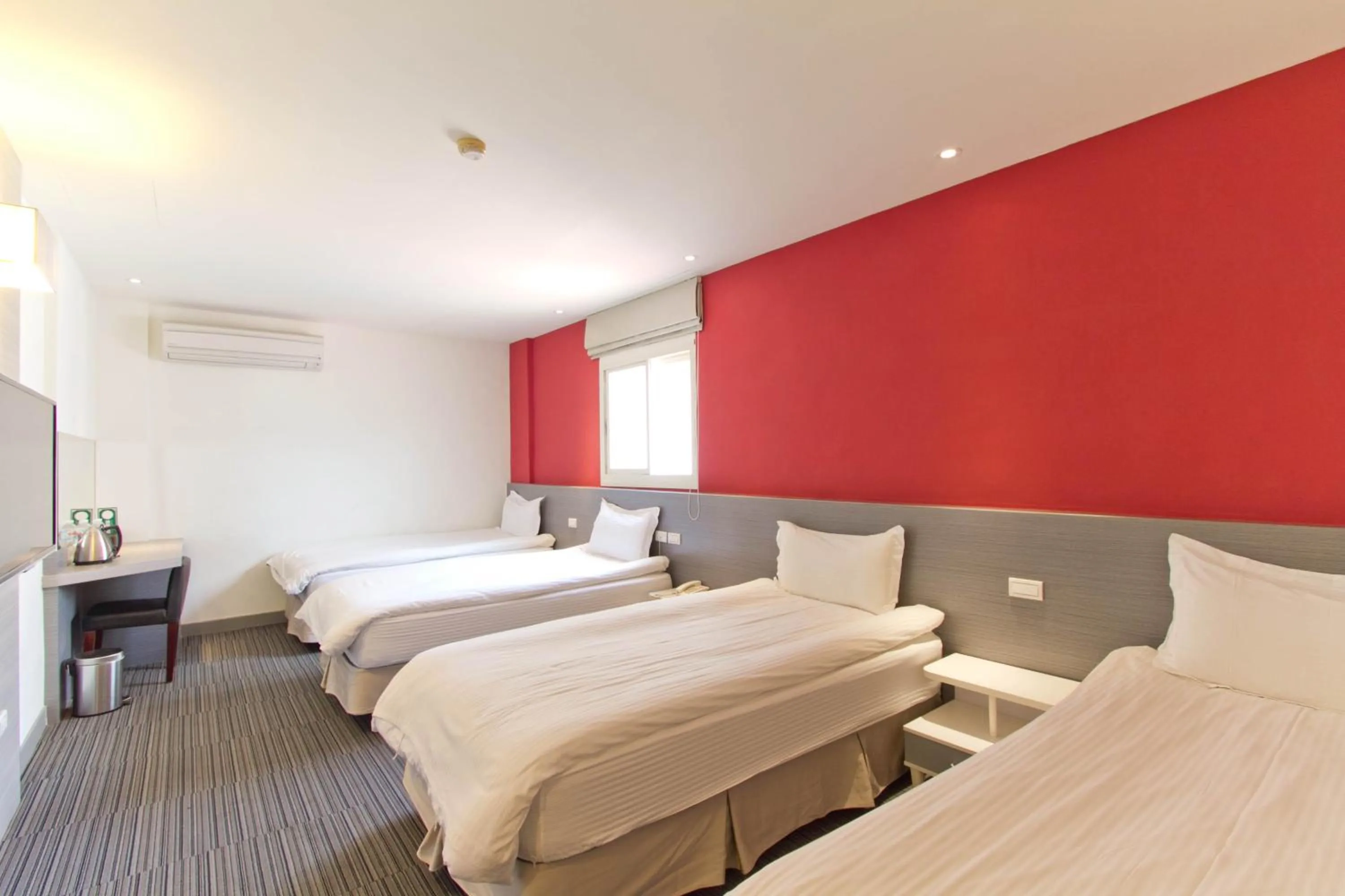 Bed in Hai Fu Hotel & Suites