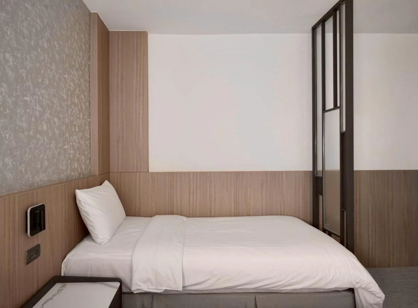 Bed in Hai Fu Hotel & Suites