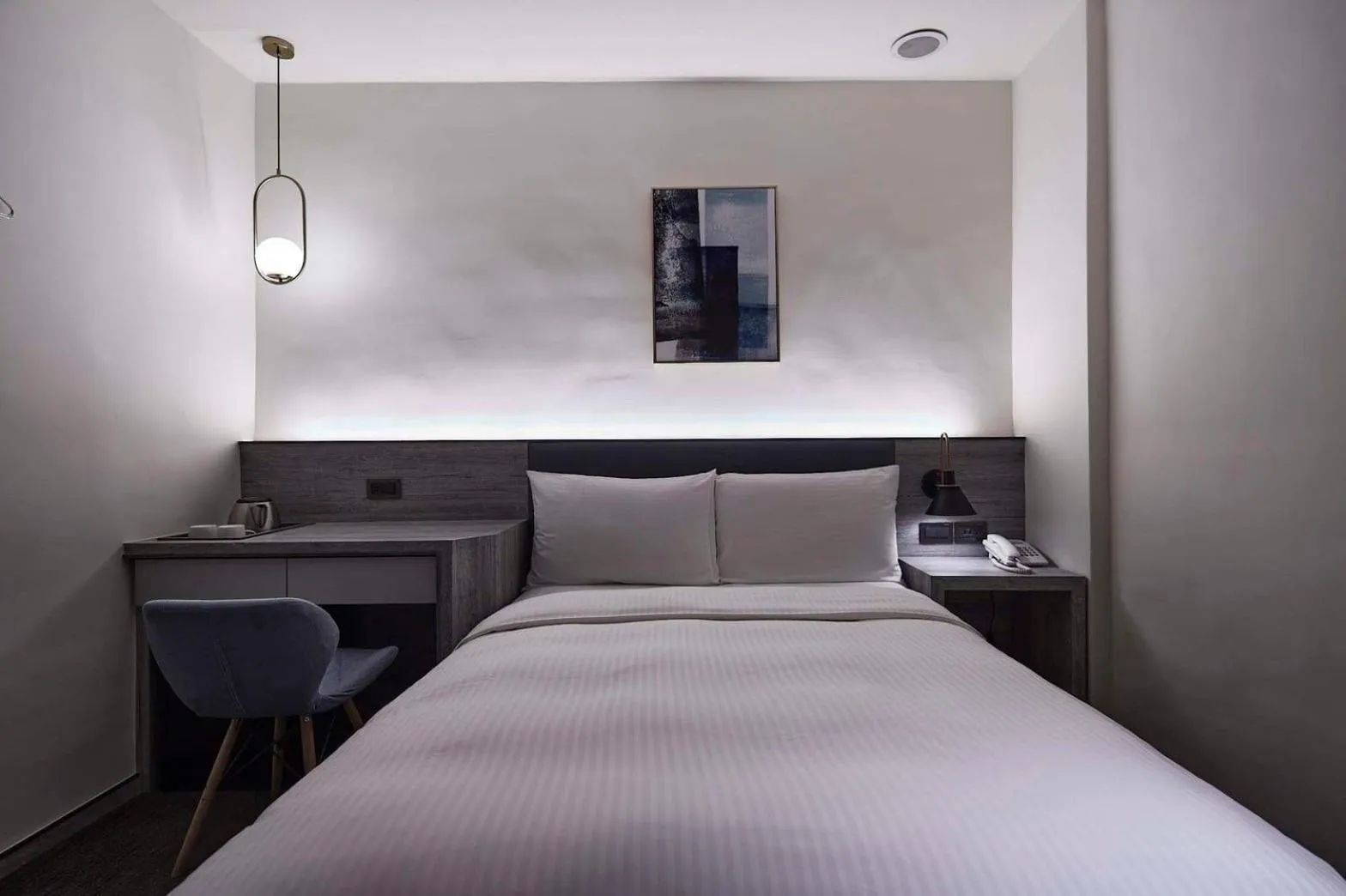 Bed in Hai Fu Hotel & Suites