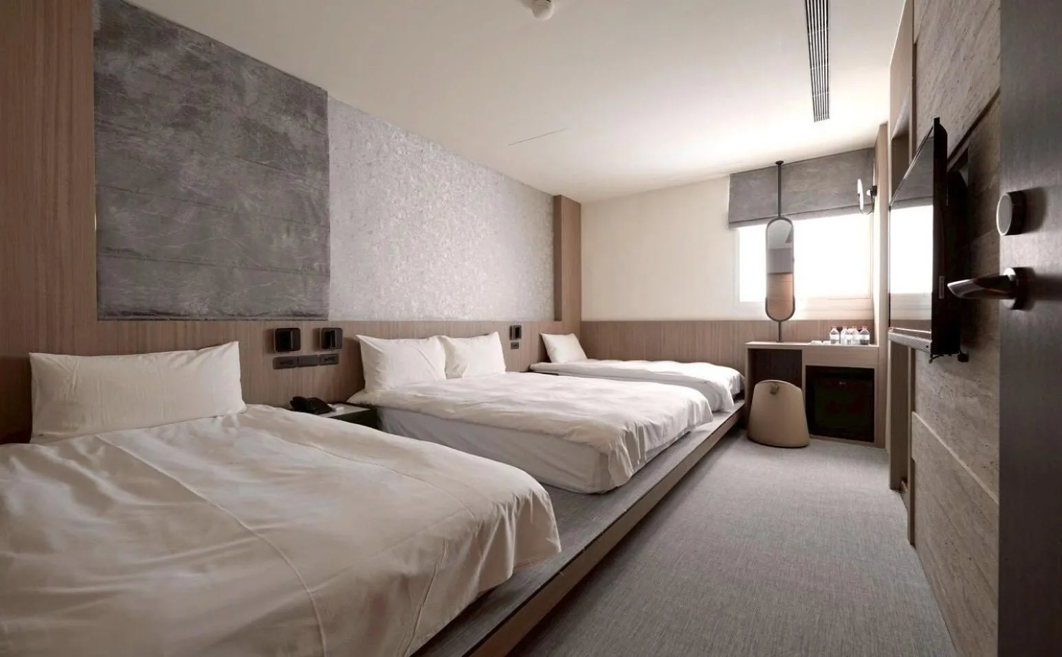 Bed in Hai Fu Hotel & Suites