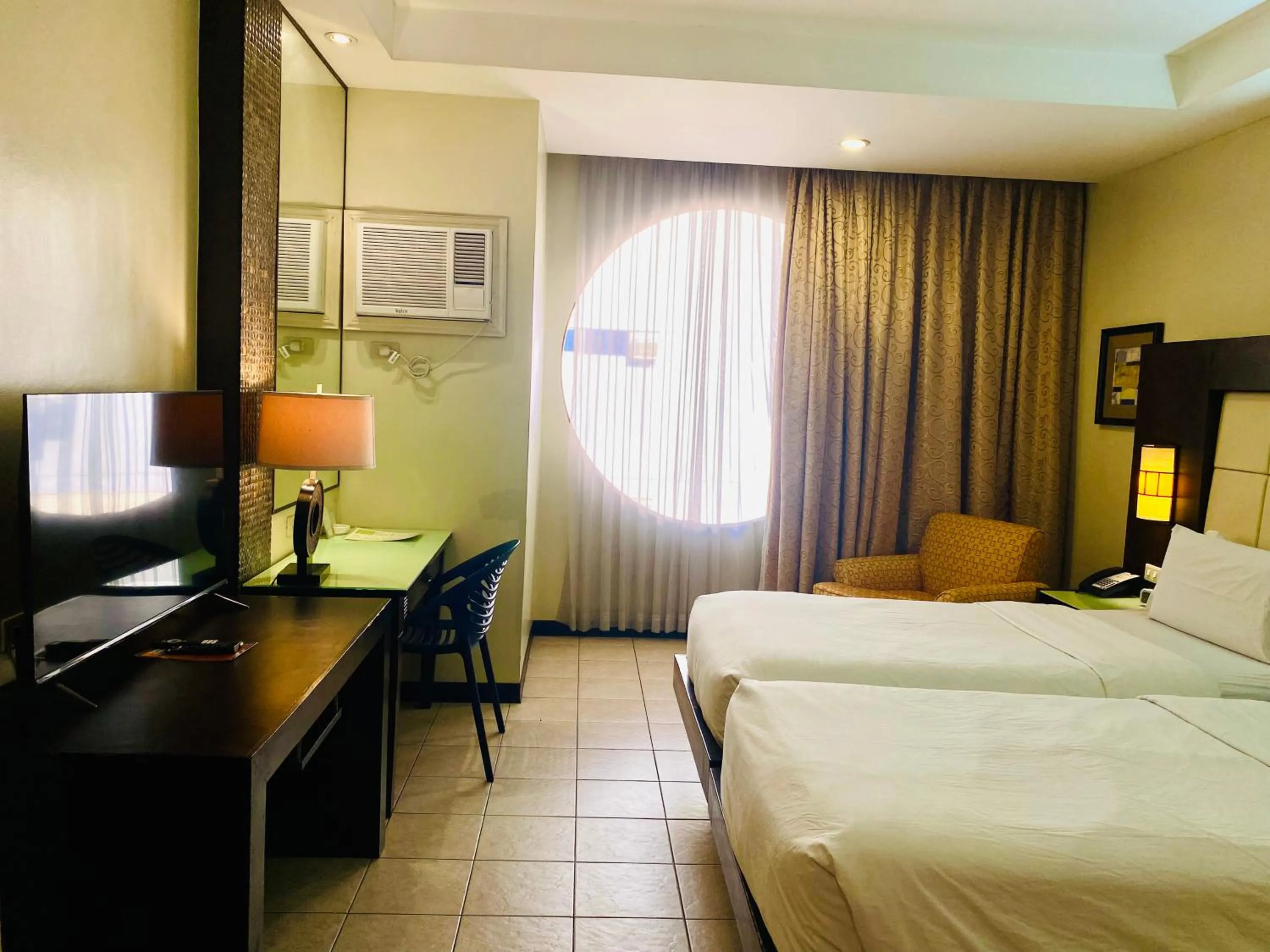 Bedroom, Bed in Circle Inn Hotel and Suites Bacolod