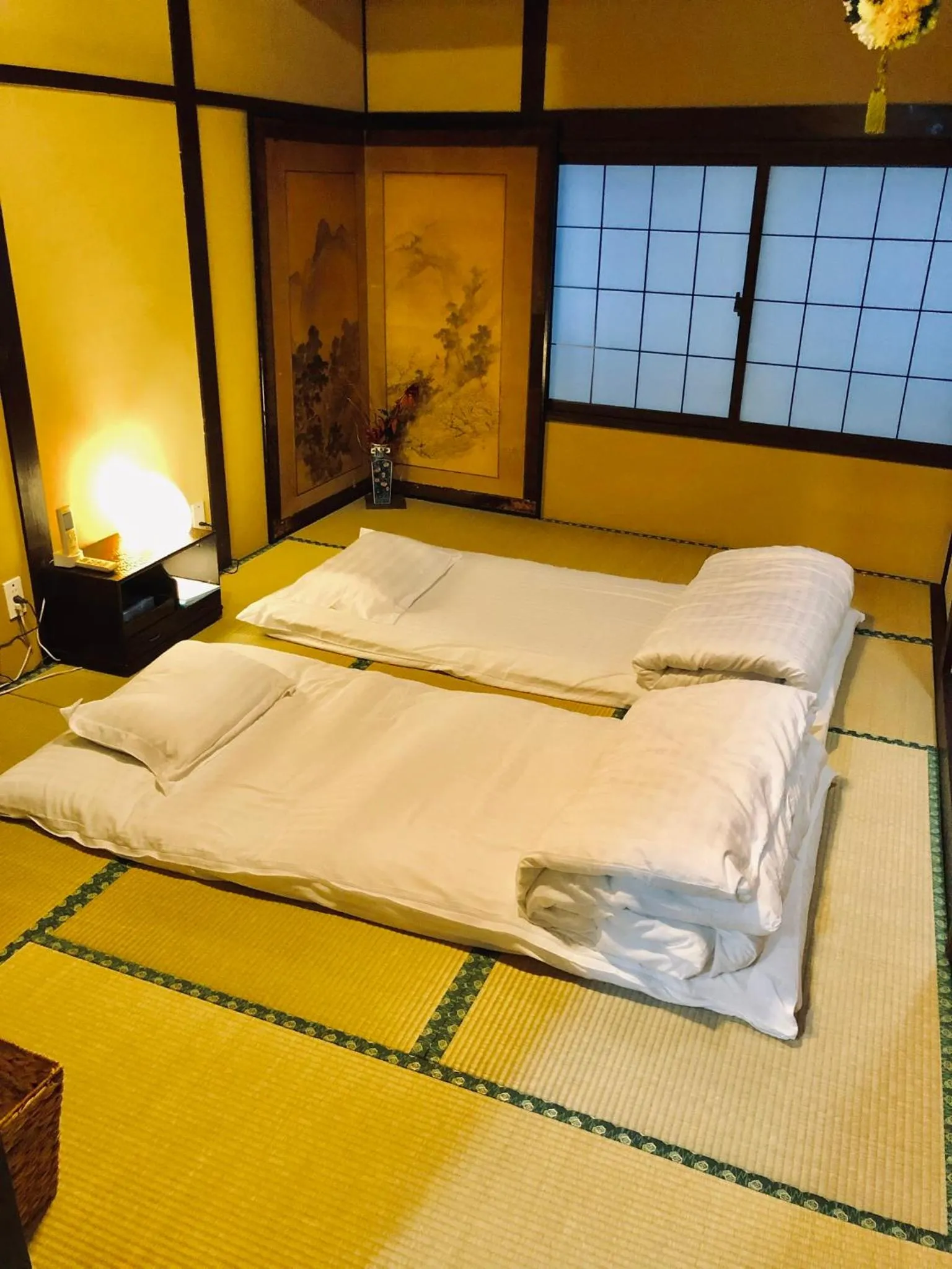 Bed in 京町家-椿庵Kyomachiya-Tsubakian