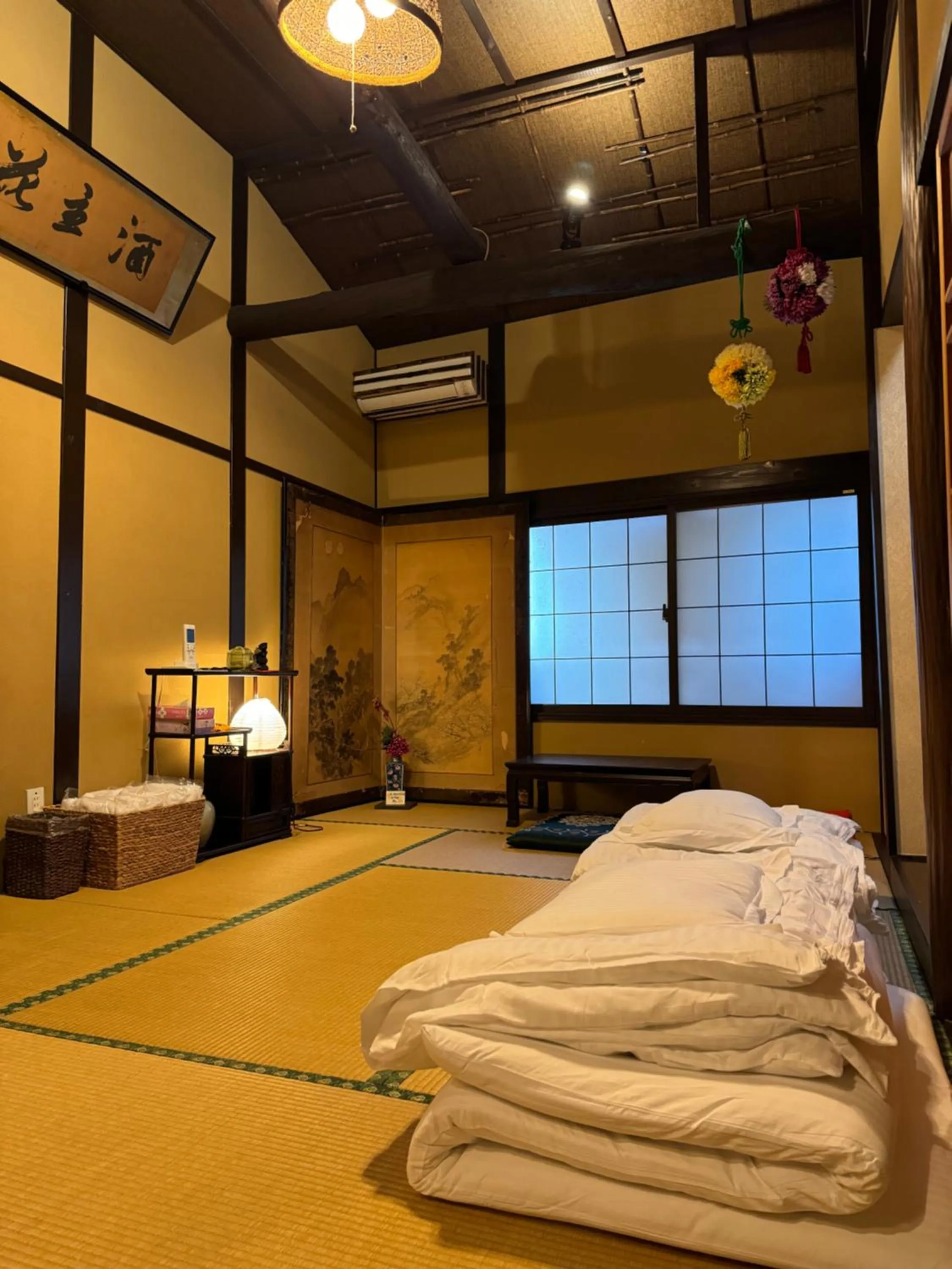 Bed in 京町家-椿庵Kyomachiya-Tsubakian
