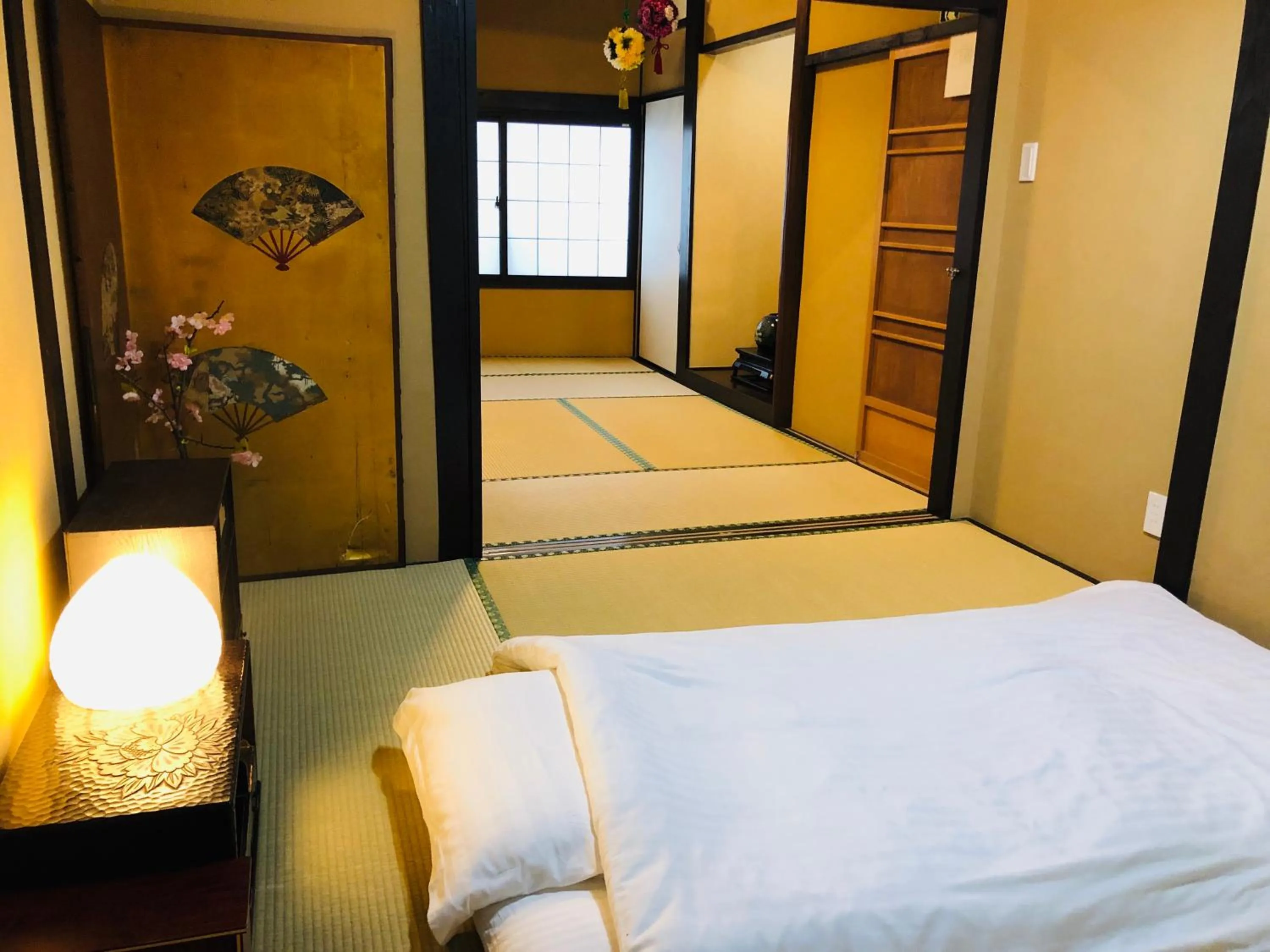 Bed in 京町家-椿庵Kyomachiya-Tsubakian