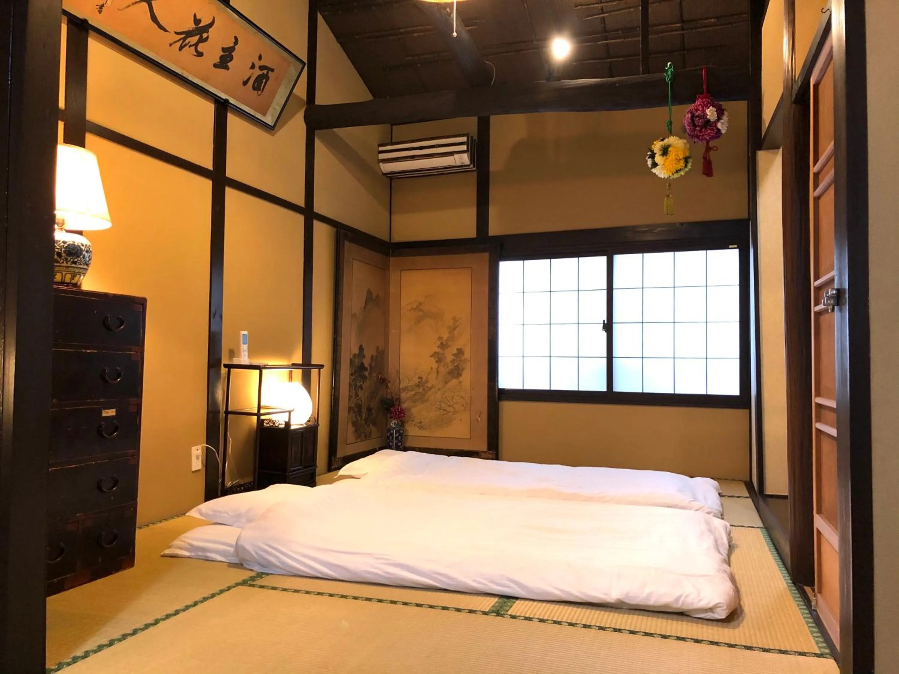 Bed in 京町家-椿庵Kyomachiya-Tsubakian