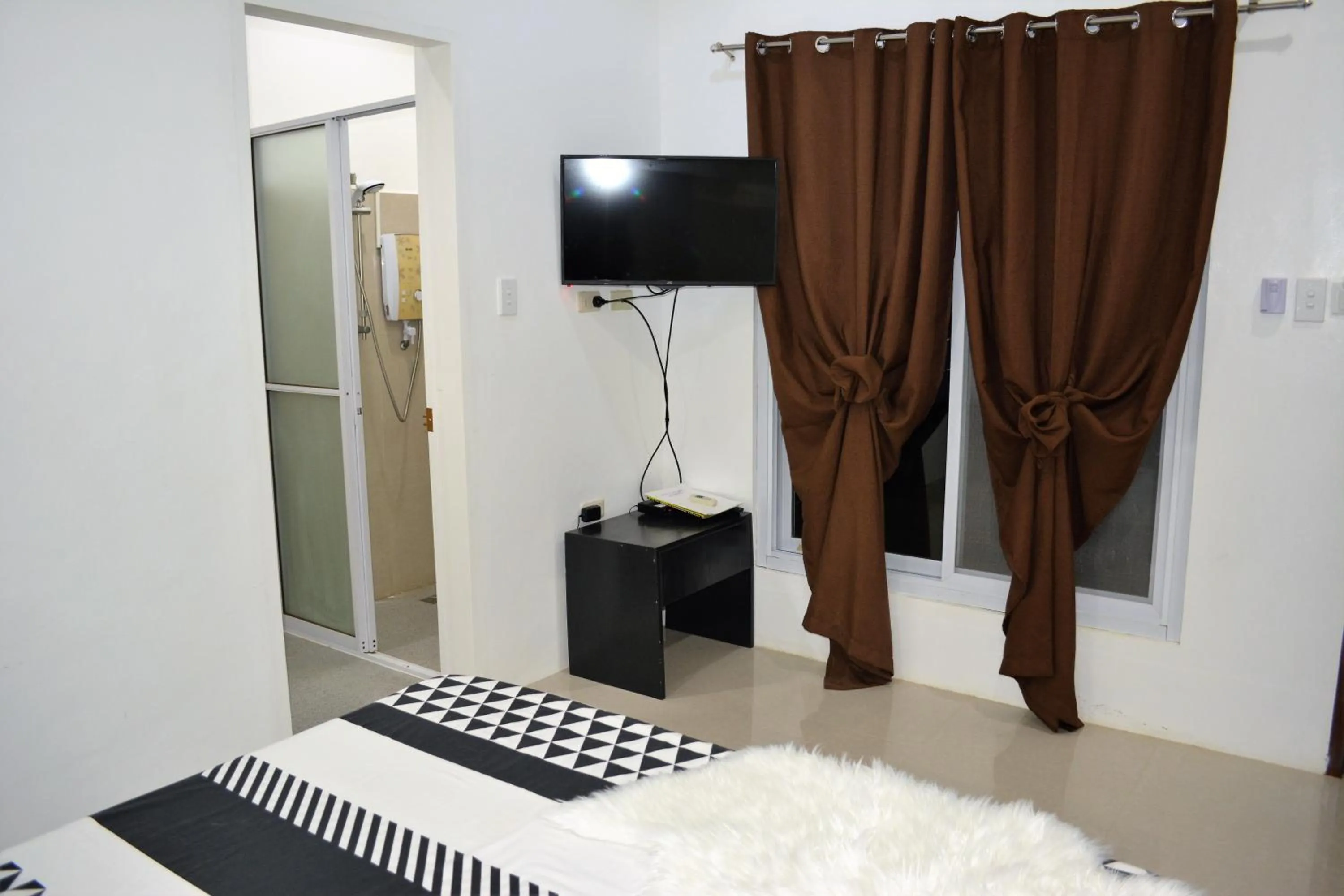 Bed in Sergi's Resort and Hotel