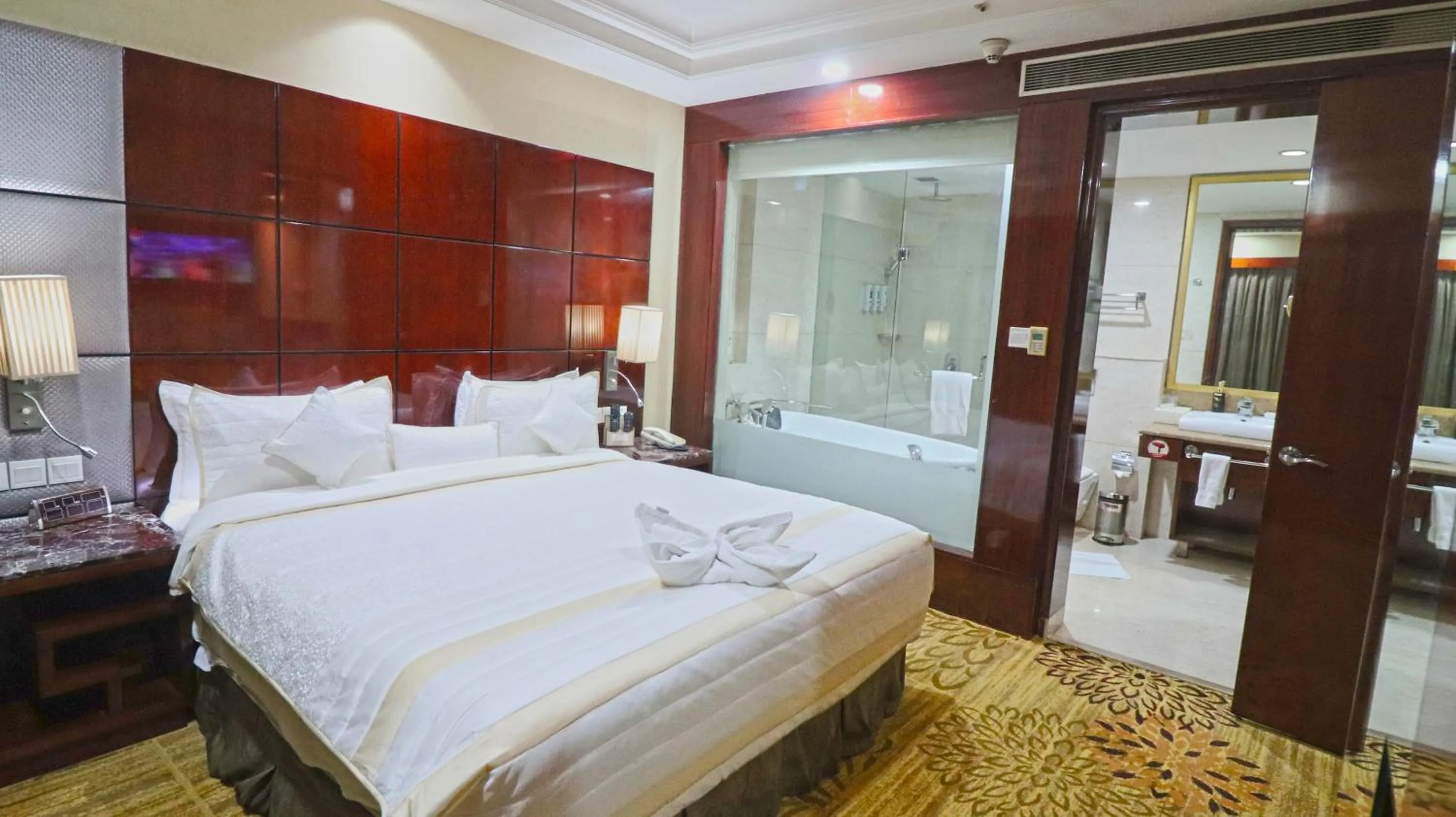 Bathroom, Bed in SkyCity Hotel Gurgaon