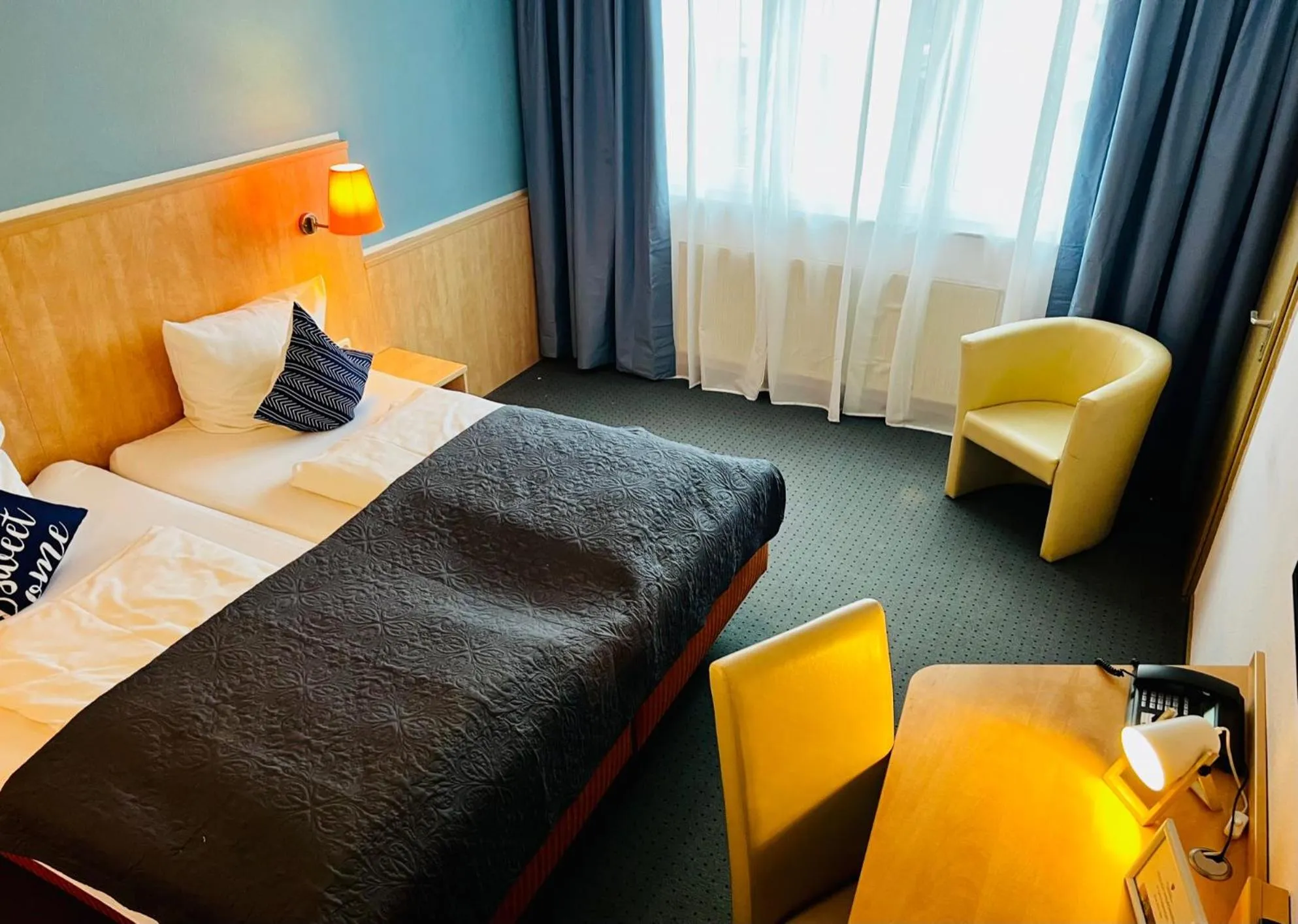 Bed in Konferenzhotel Ysenburger Hof