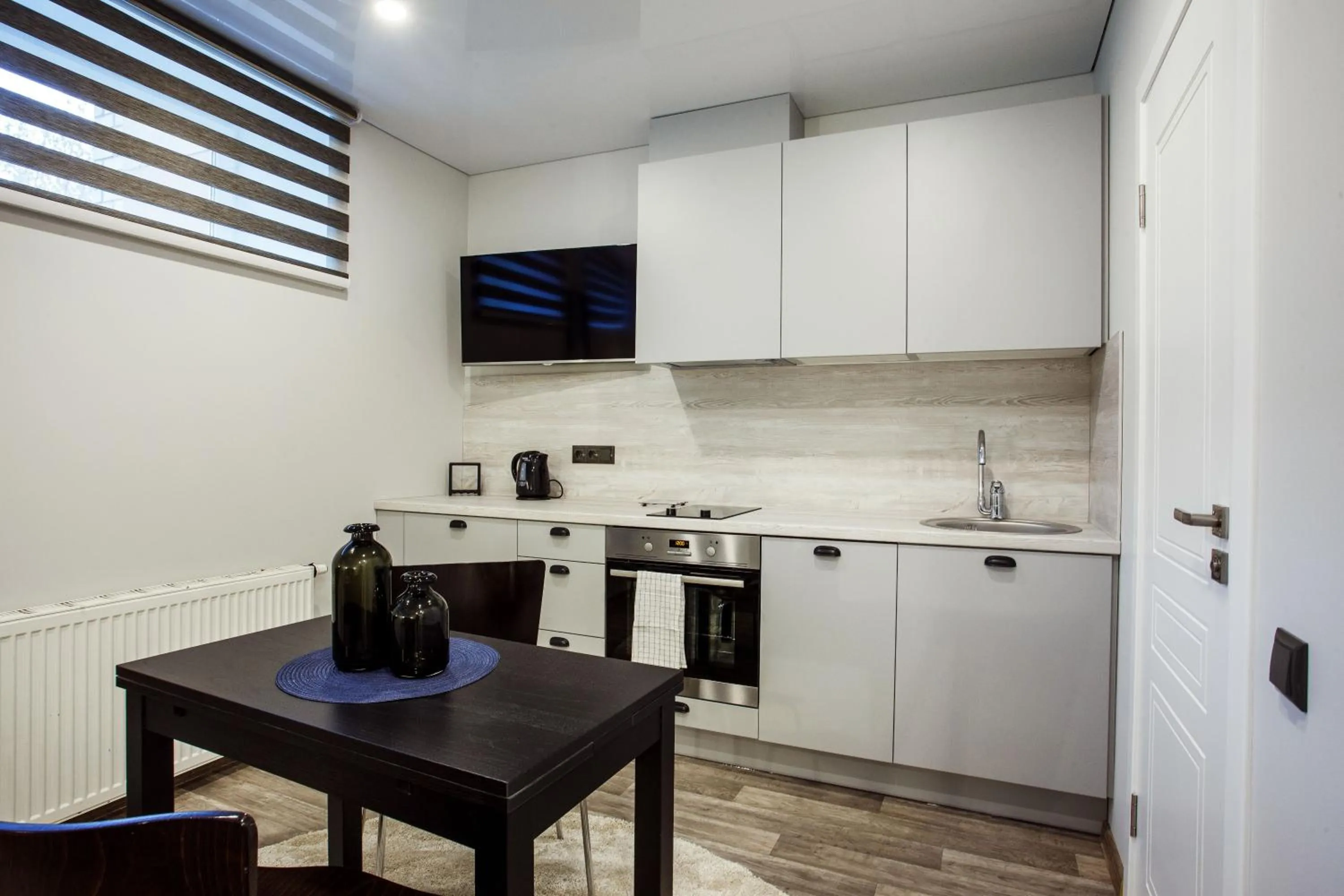 Kitchen or kitchenette in Old Town Trio Apartments