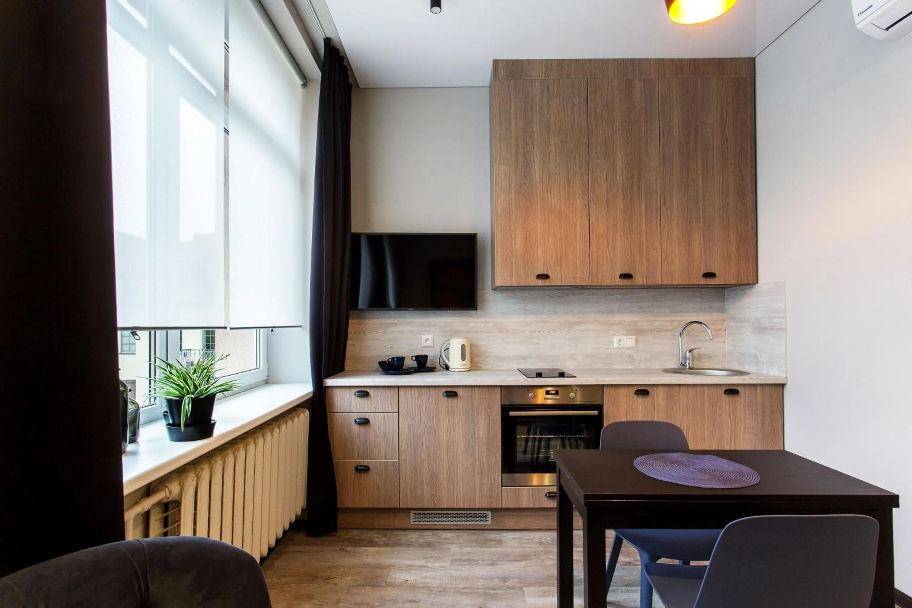 Kitchen or kitchenette in Old Town Trio Apartments