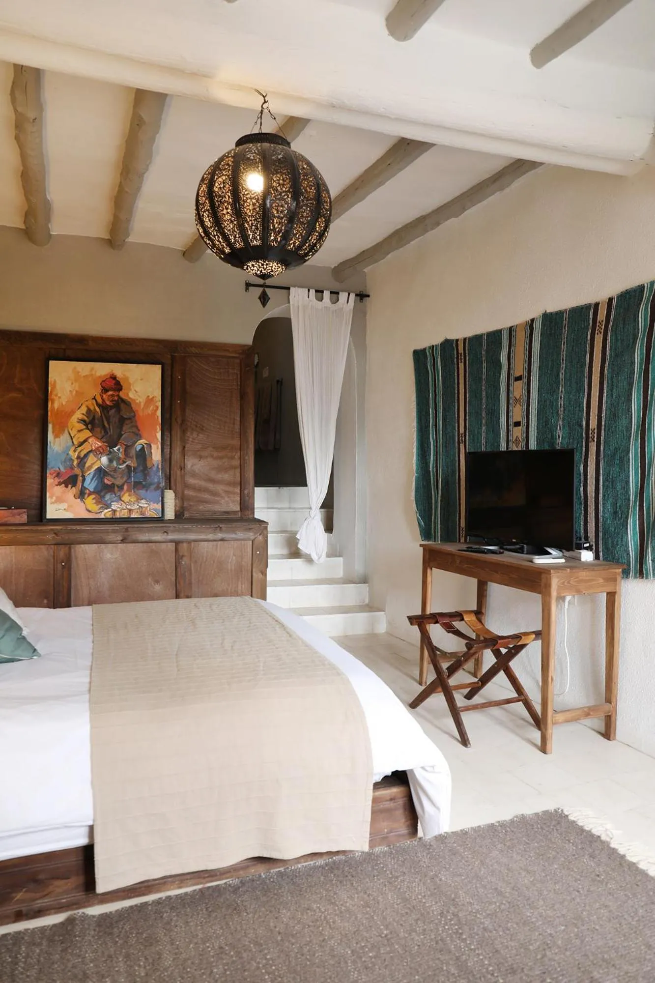 Bed in Le Petit Hôtel du Flouka