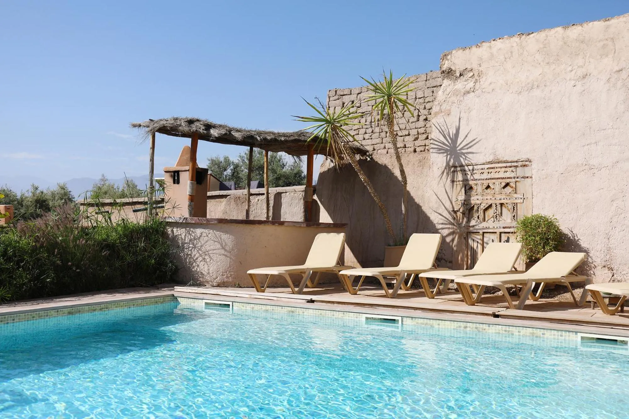 Swimming pool in Le Petit Hôtel du Flouka