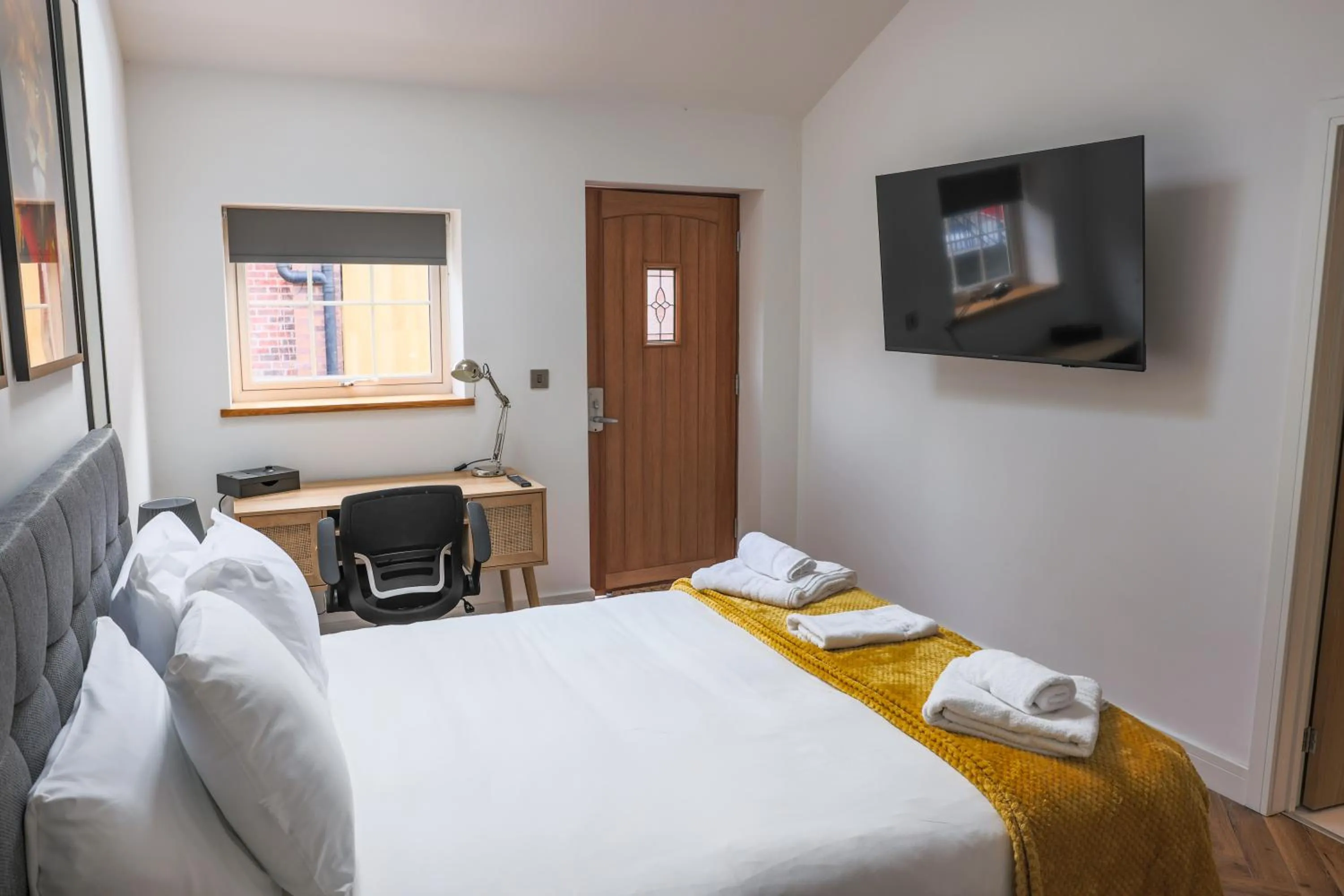 Bed in The Coach Hotel