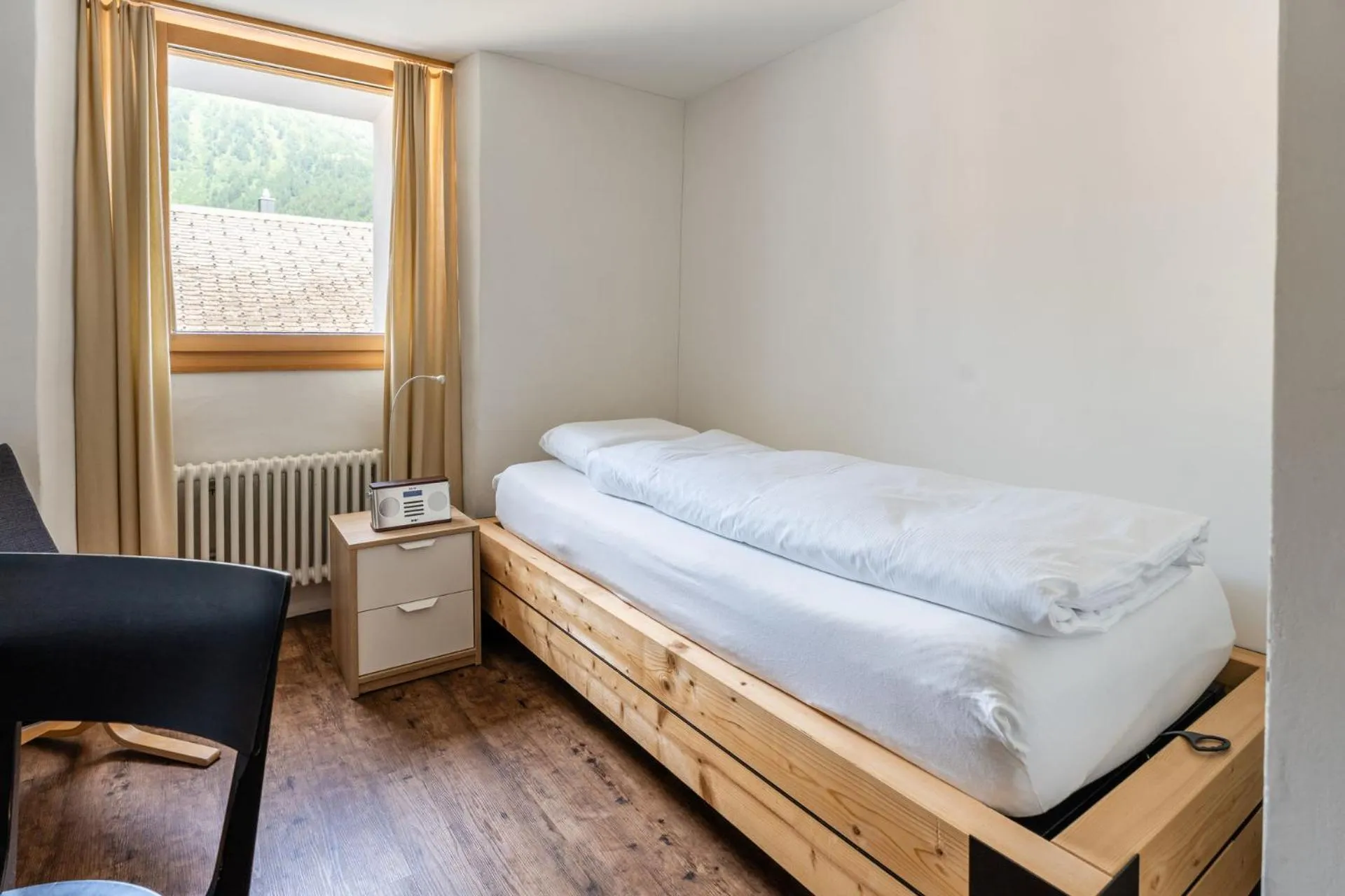 Bed in Hotel Furka