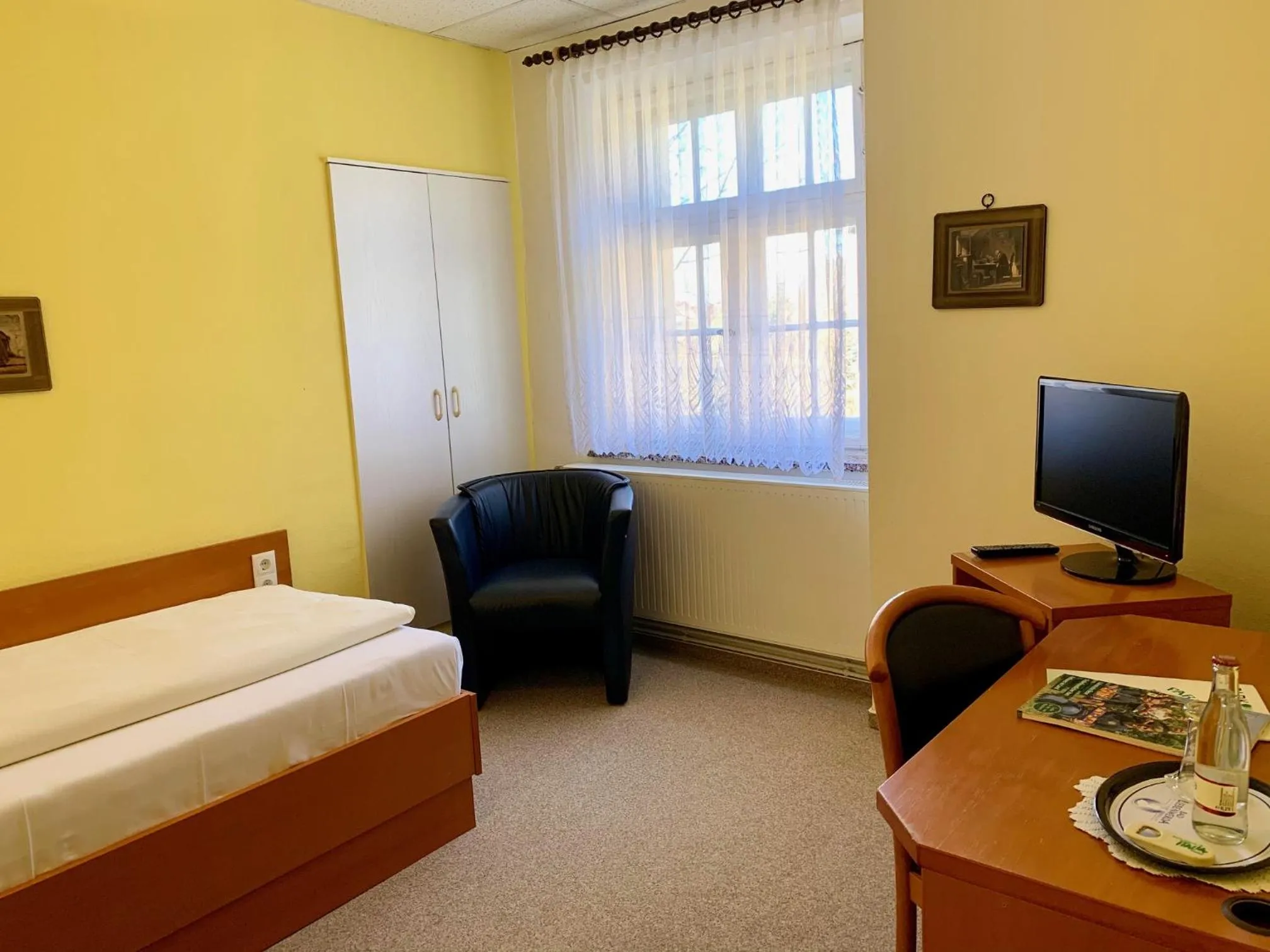 Photo of the whole room, Bed in Parkhotel Pretzsch