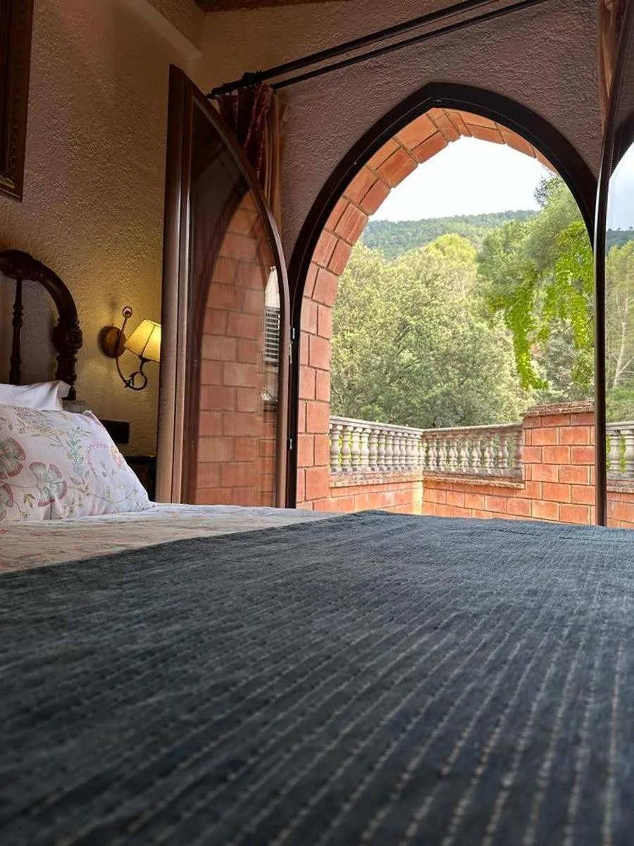 Bed in Hotel Rural Convento Santa Maria de la Sierra