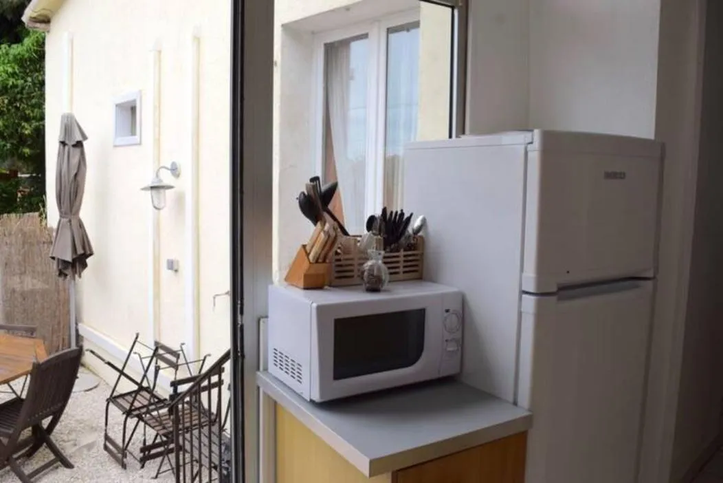 Kitchen or kitchenette in Hotel L'Orangeraie