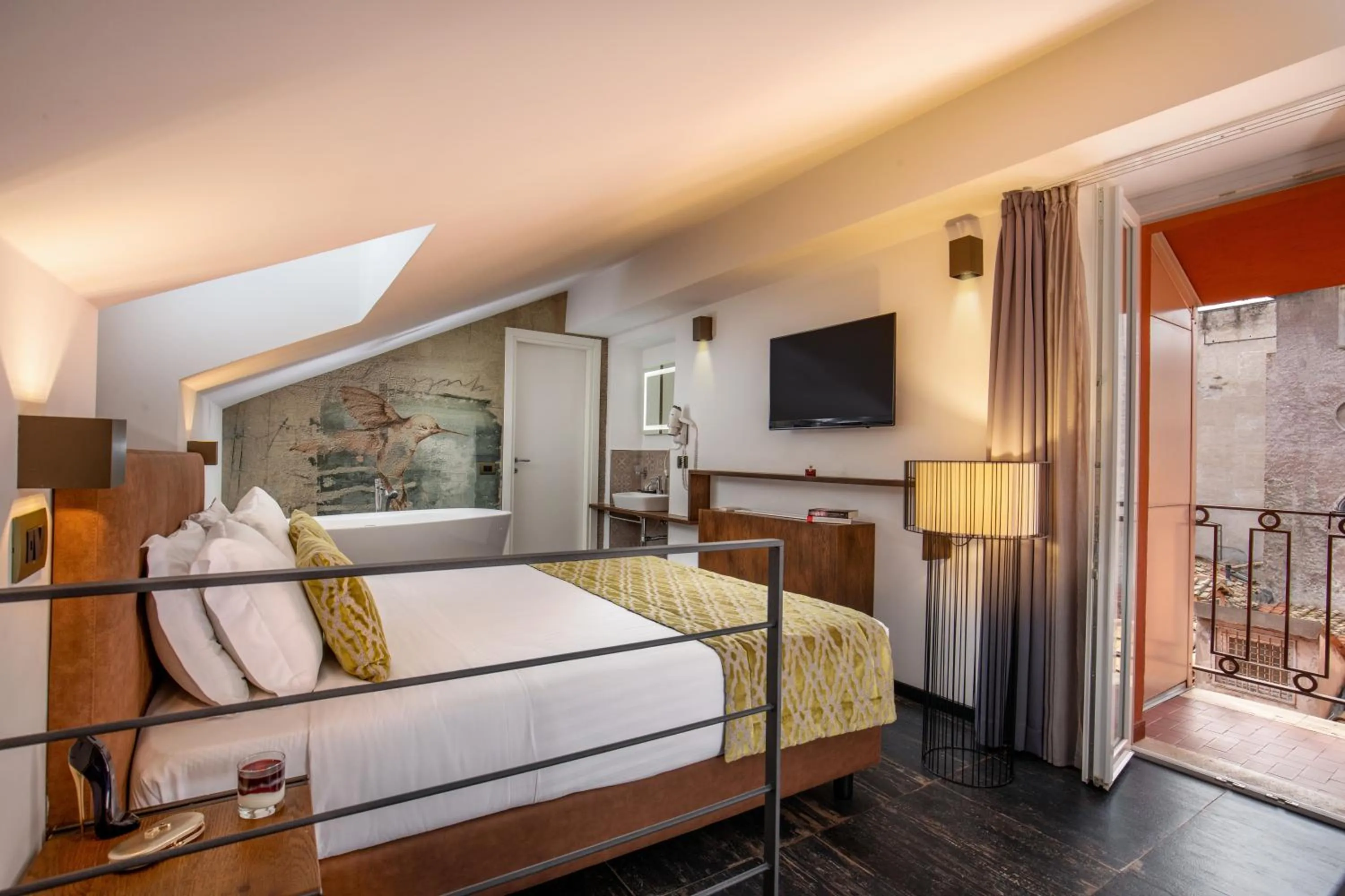 Bed in Navona Essence Hotel