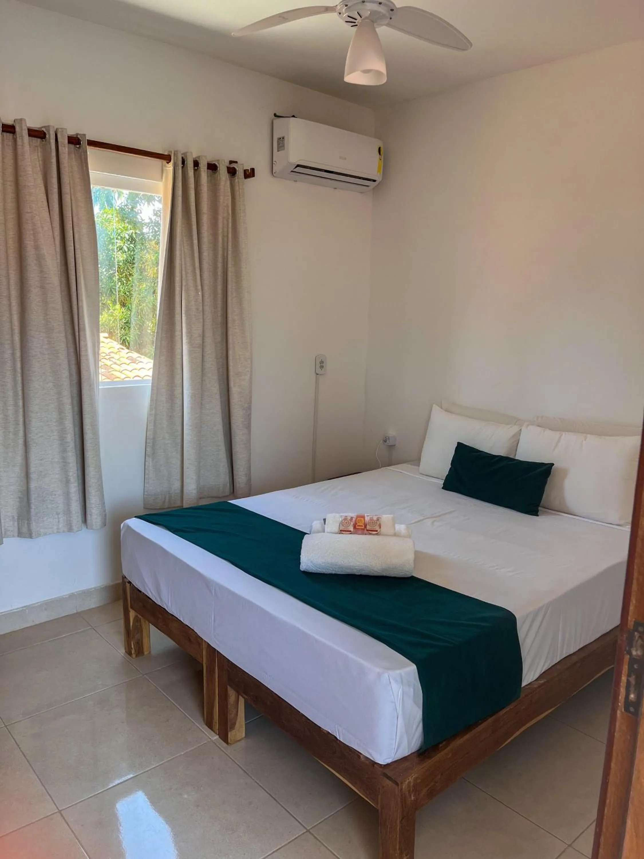 Bed in Pousada Enero