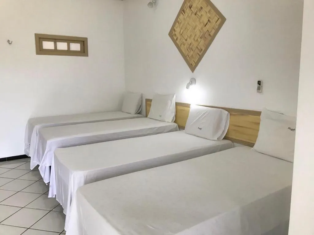 Bed in Pousada do Mingote