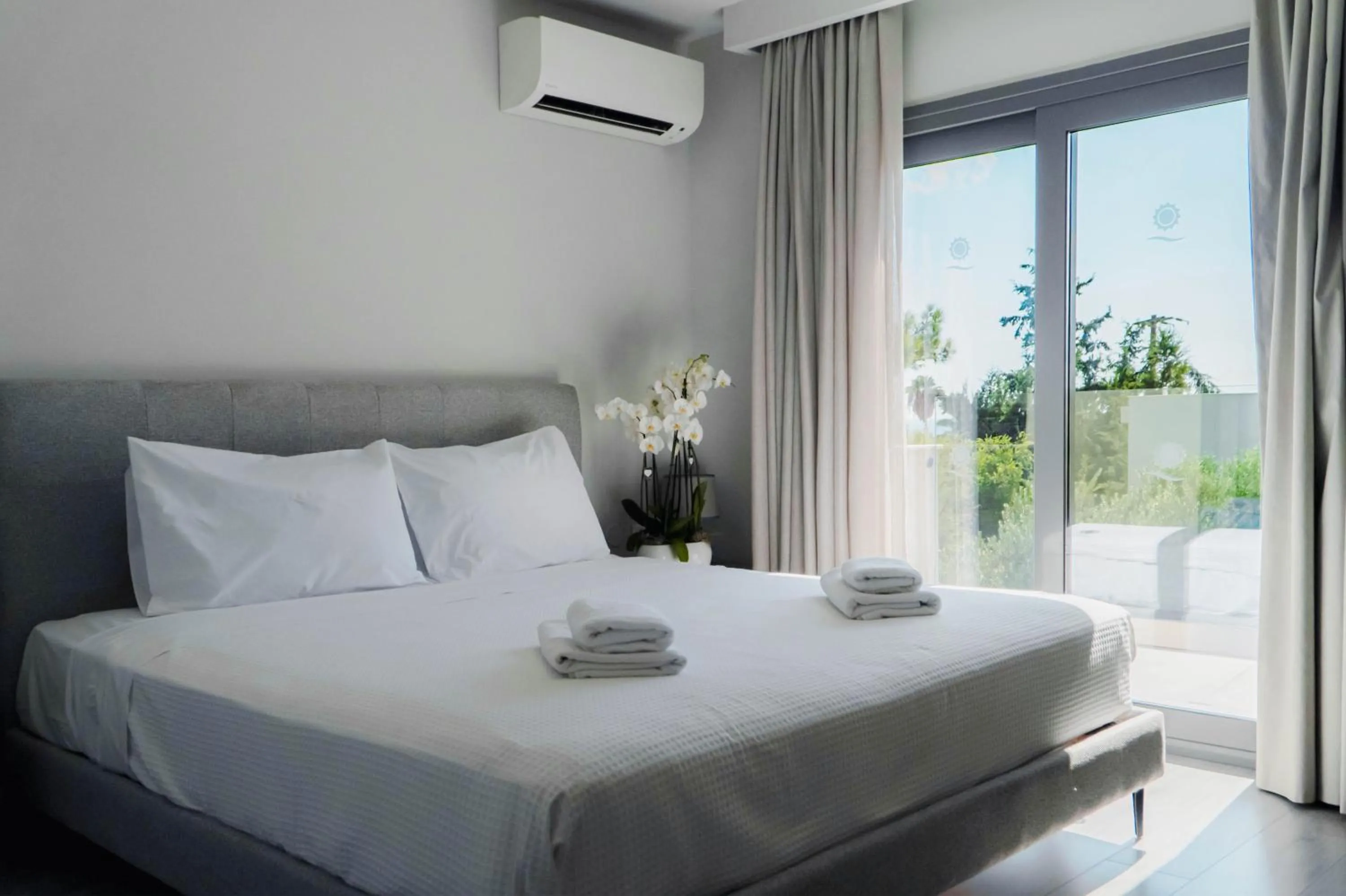 Bed in Princess Sun Hotel